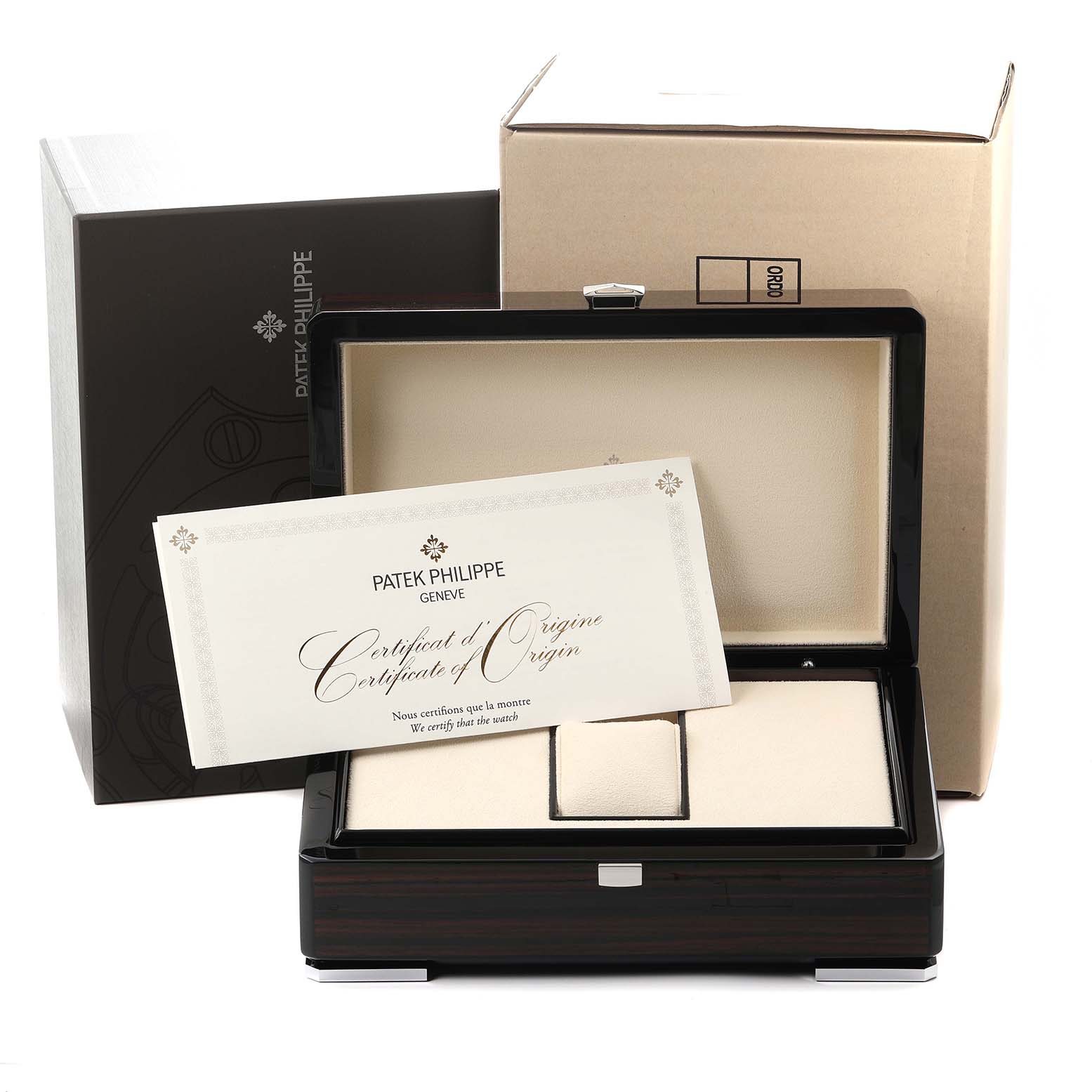 The image shows the packaging of a Patek Philippe Complications 5930G-001 Men
s White Gold Blue Dial watch, including a box and certificate, viewed from a front angle.