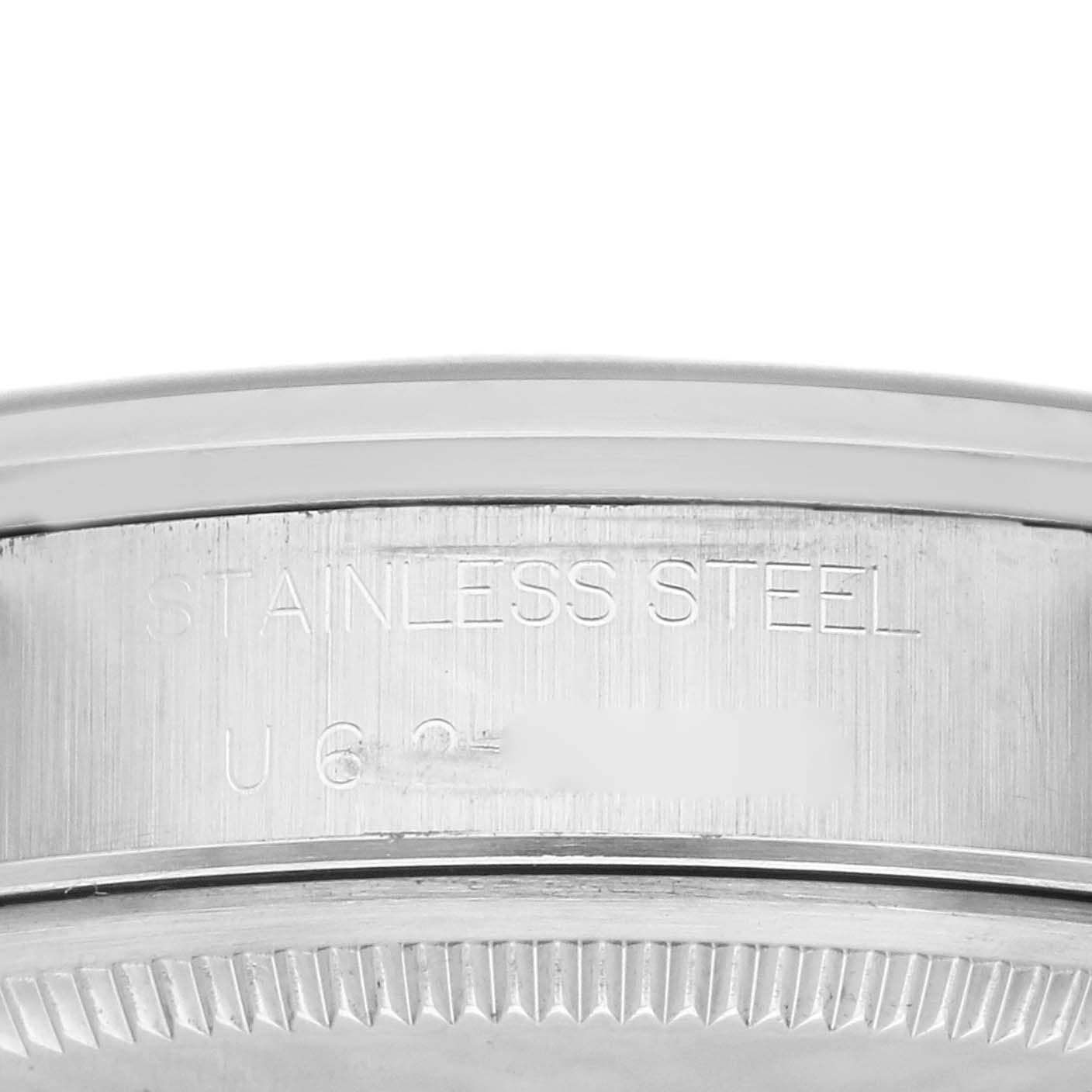 The image shows the side engraving on the stainless steel case of a Rolex Air-King 14000 Men's Stainless Steel Pink Dial 14000 Men's Stainless Steel Pink Dial watch.