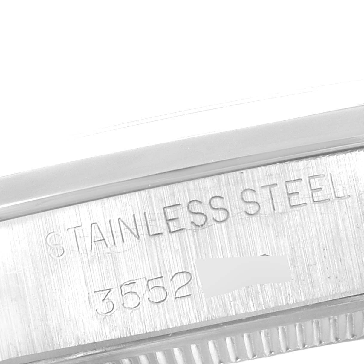 This image displays the side view of the stainless steel casing of a Vintage Collection model by Rolex.