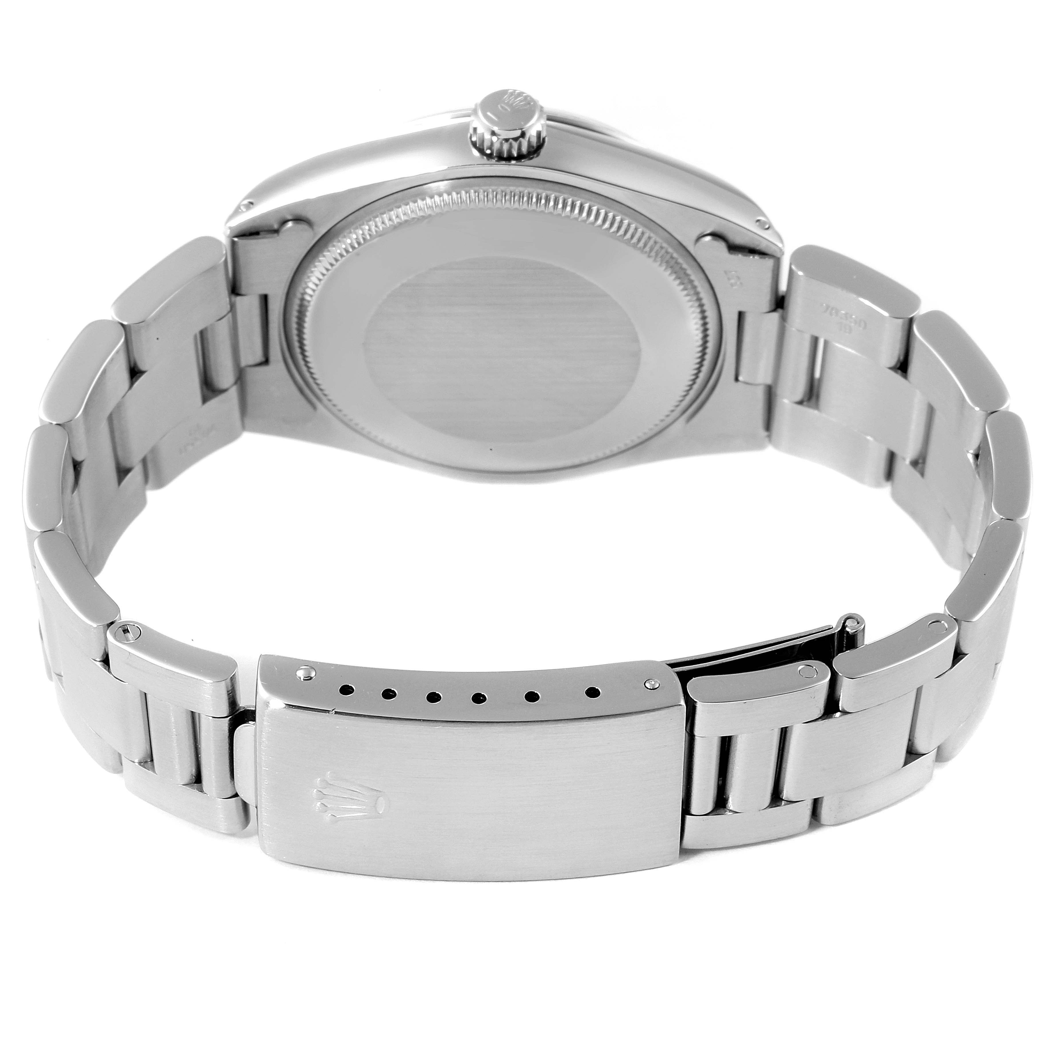 The image shows the back and bracelet of a Rolex Vintage Collection 5500 Men
s Stainless Steel Silver Dial 5500 Men
s Stainless Steel Silver Dial model watch.