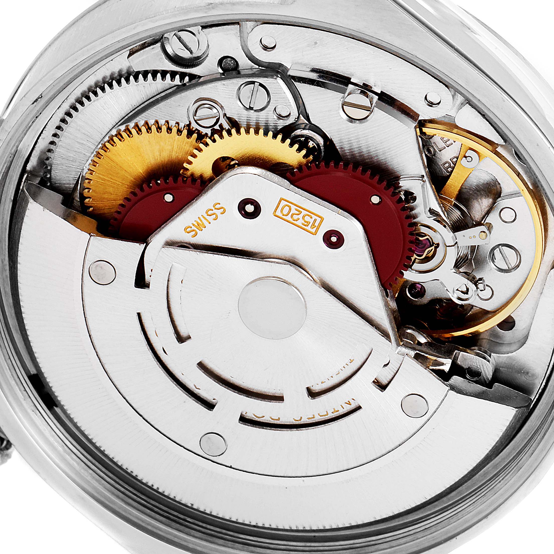 This close-up image shows the intricate internal mechanism of the Rolex Vintage Collection 5500 Men
s Stainless Steel Silver Dial 5500 Men
s Stainless Steel Silver Dial watch, highlighting the gears and rotor.