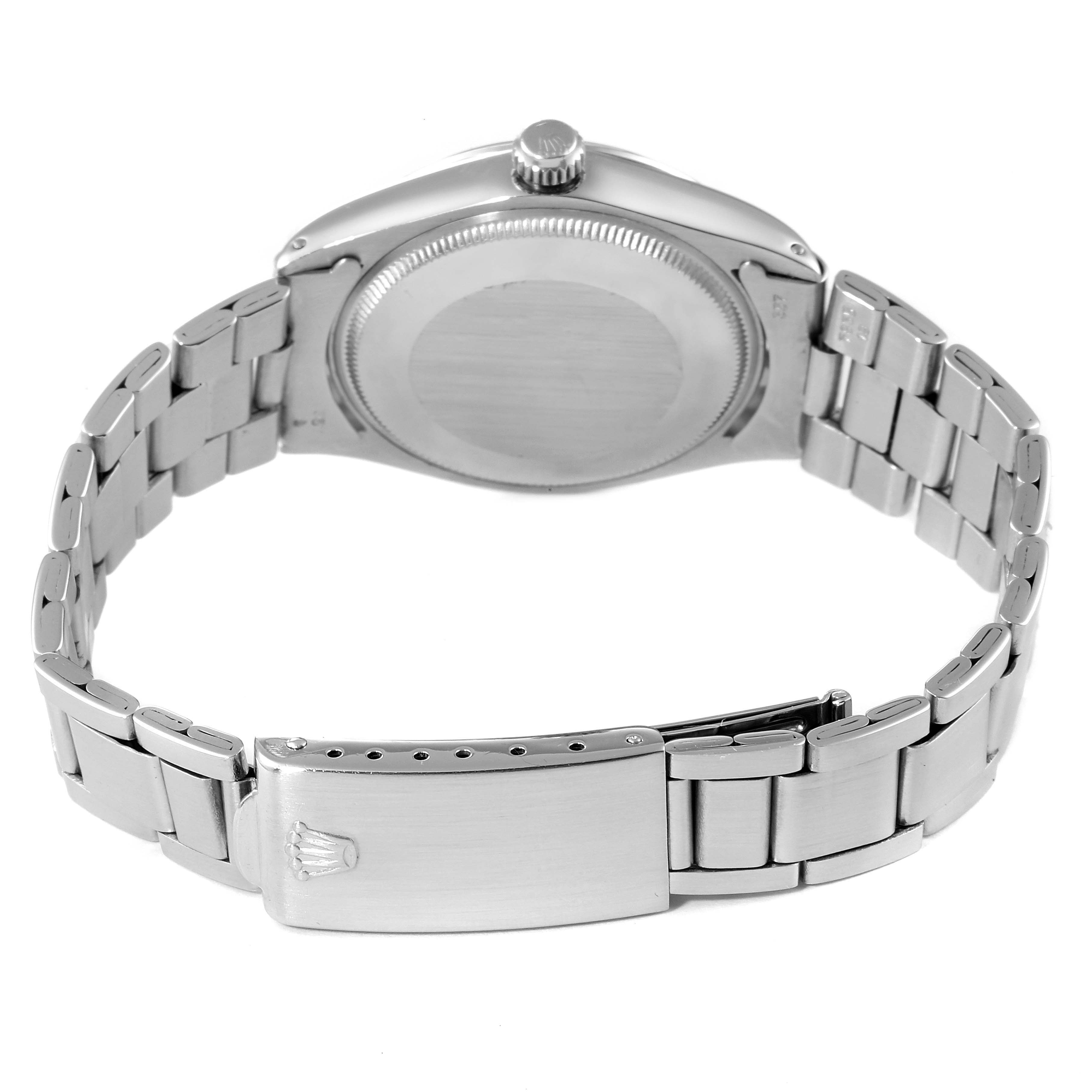 The image shows the back view of the Rolex Vintage Collection 5500 Men
s Stainless Steel Silver Dial 5500 Men
s Stainless Steel Silver Dial model, highlighting the closed clasp and metal bracelet.