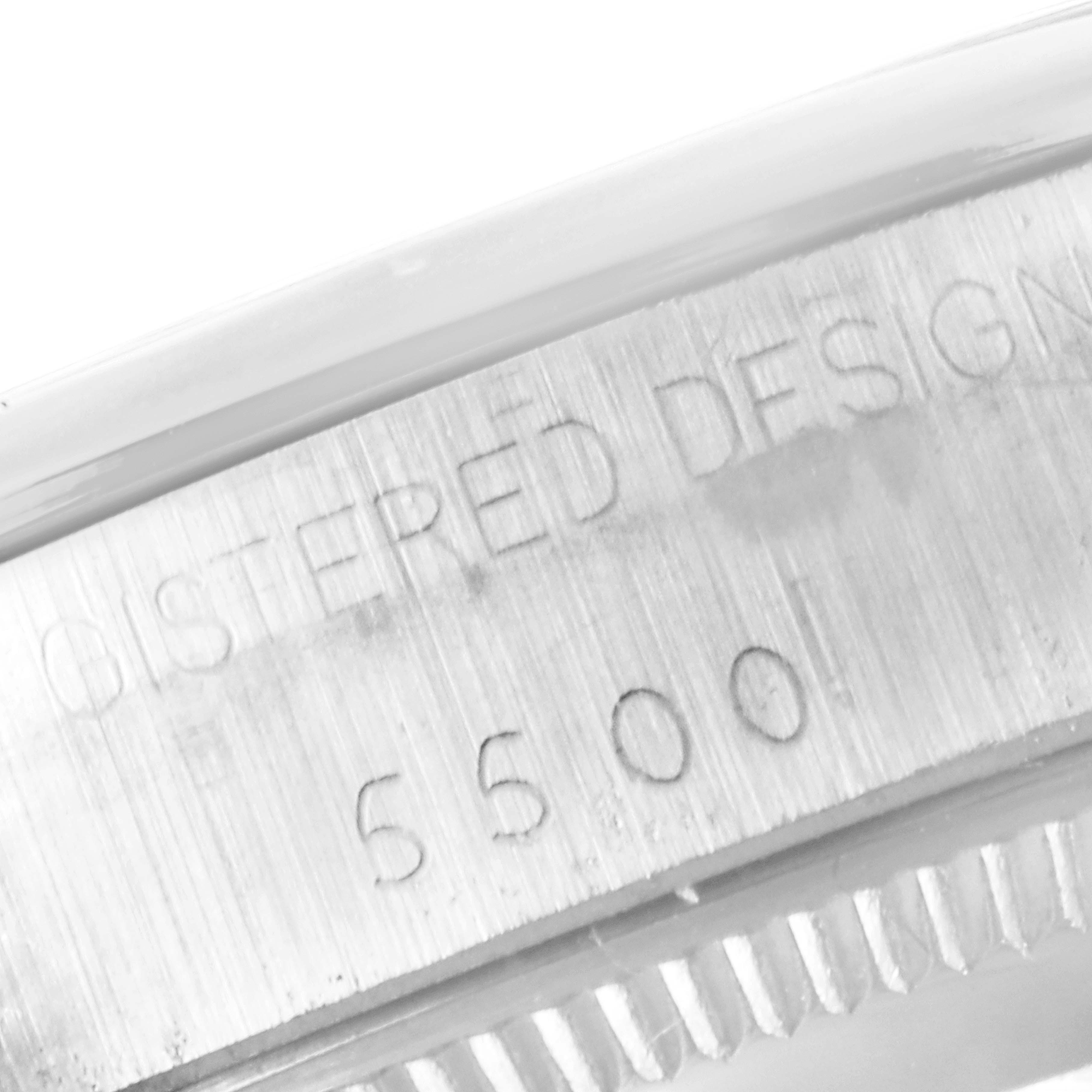 This image shows a close-up angle of the Rolex Vintage Collection 5500 Men
s Stainless Steel Silver Dial 5500 Men
s Stainless Steel Silver Dial model, focusing on the engraved serial number and casing details.