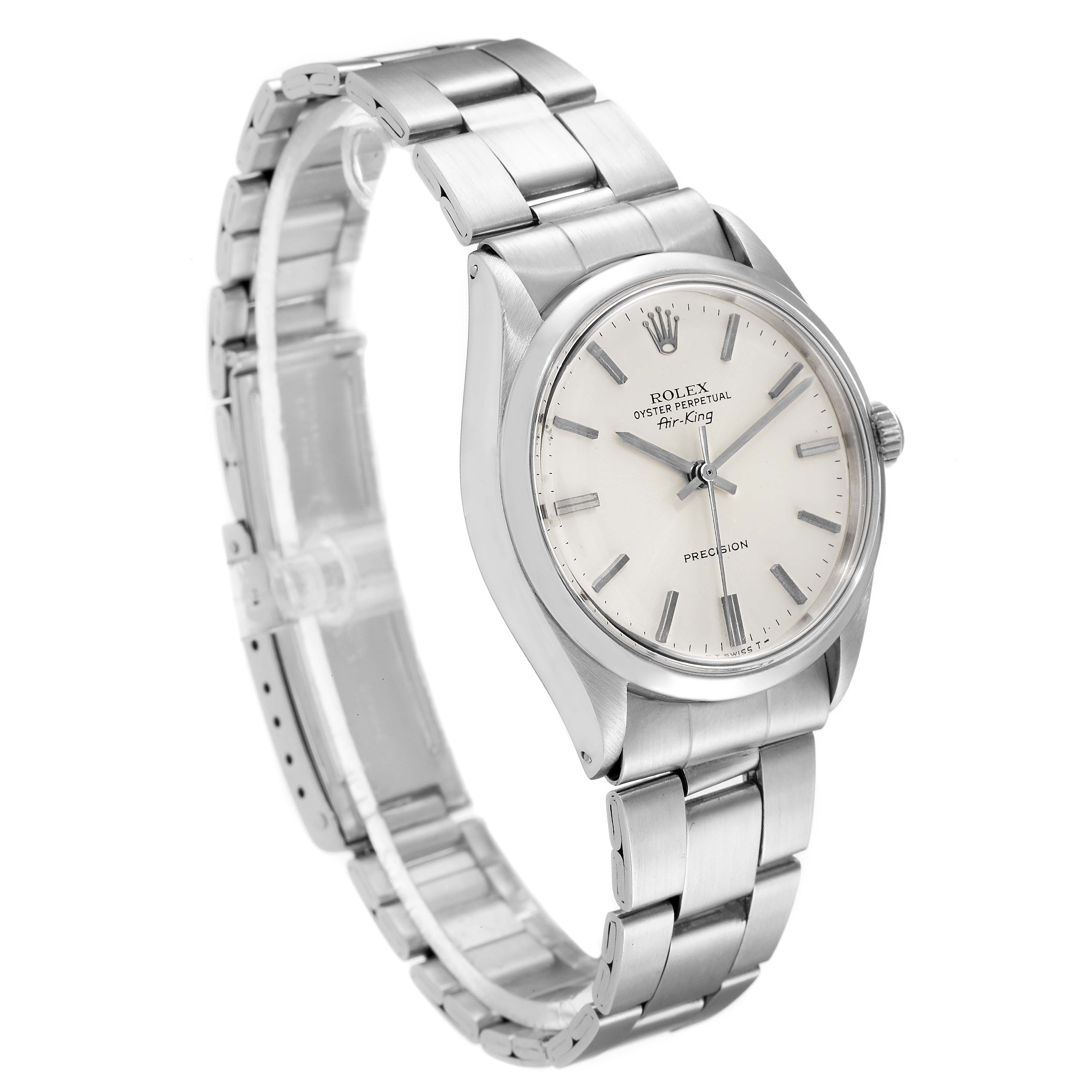 The image shows a side angle view of the Rolex Vintage Collection 5500 Men
s Stainless Steel Silver Dial 5500 Men
s Stainless Steel Silver Dial model, highlighting its stainless steel band and clock face.