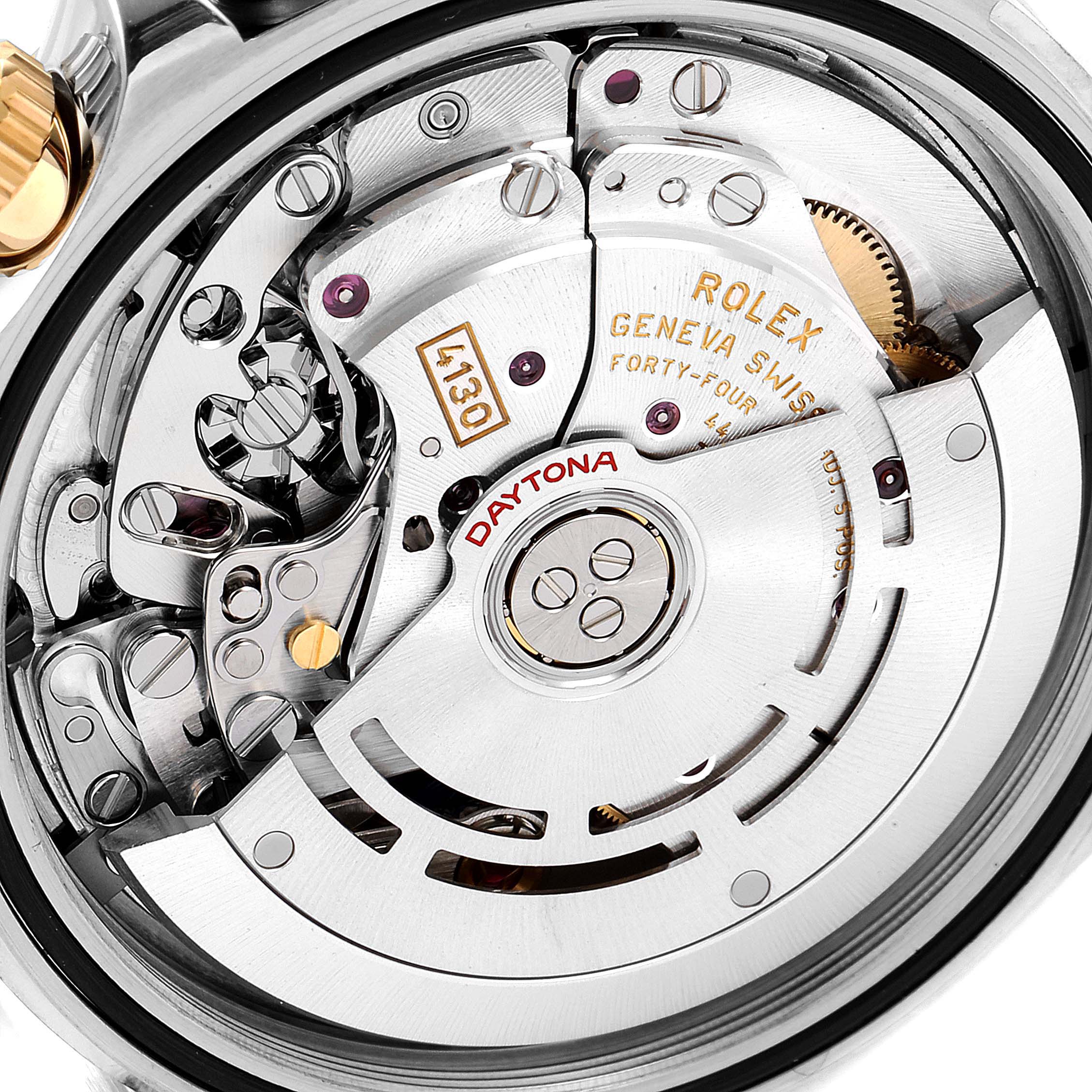 This image shows a close-up view of the Rolex Daytona 116503 Men
s Steel and Gold (two tone) White Dial 116503 Men
s Steel and Gold (two tone) White Dial
s internal movement mechanism components.