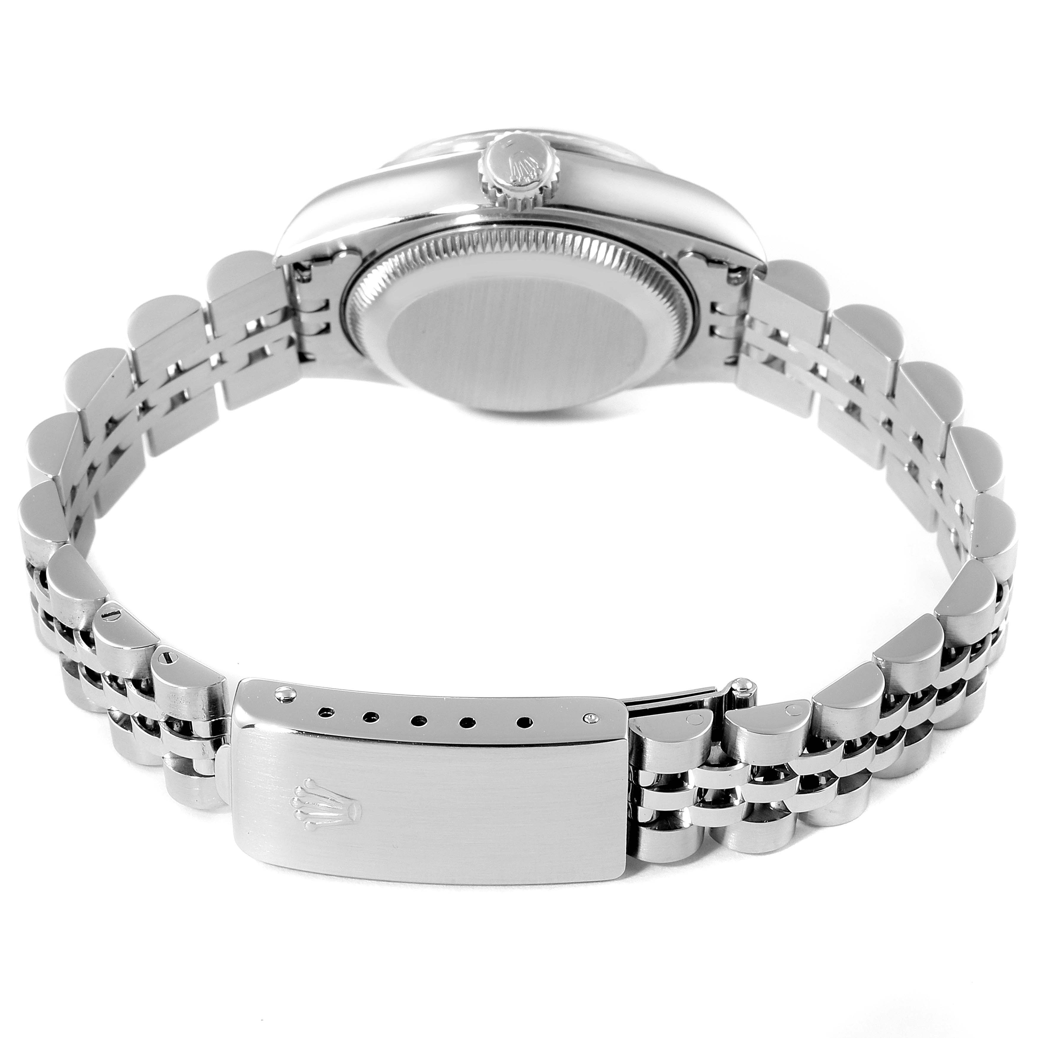 The image shows the back and side view of a Rolex Date 69240 Women's Stainless Steel Black Dial 69240 Women's Stainless Steel Black Dial model wristwatch, focusing on the clasp, bracelet, and case back.