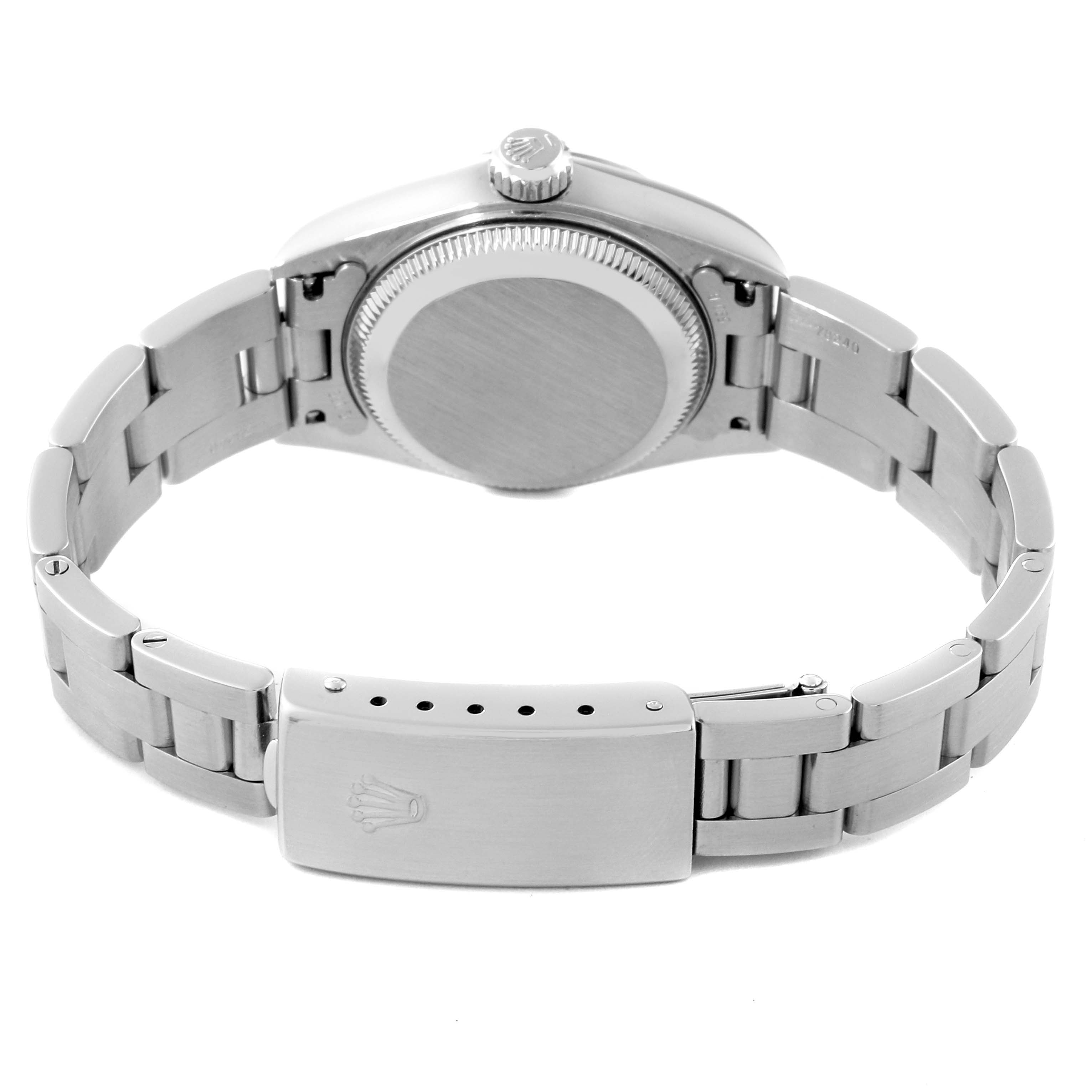 This image shows the back case, crown, and bracelet clasps of the Rolex Date 79190 Women's Stainless Steel Pink Dial 79190 Women's Stainless Steel Pink Dial model watch.