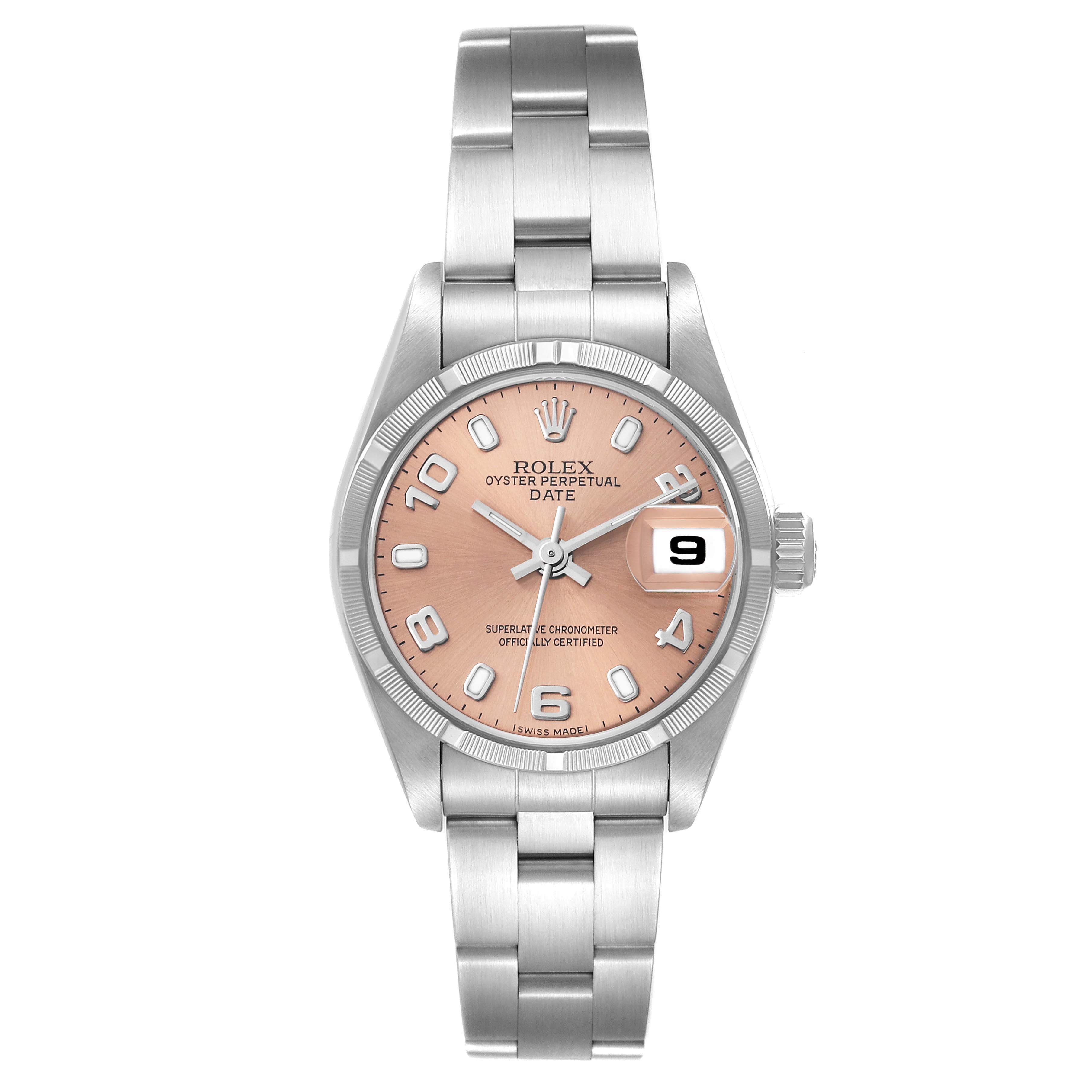 The shown Rolex Date 79190 Women's Stainless Steel Pink Dial 79190 Women's Stainless Steel Pink Dial model watch is viewed from the front, displaying its face, bracelet, and magnified date window at 3 o'clock.