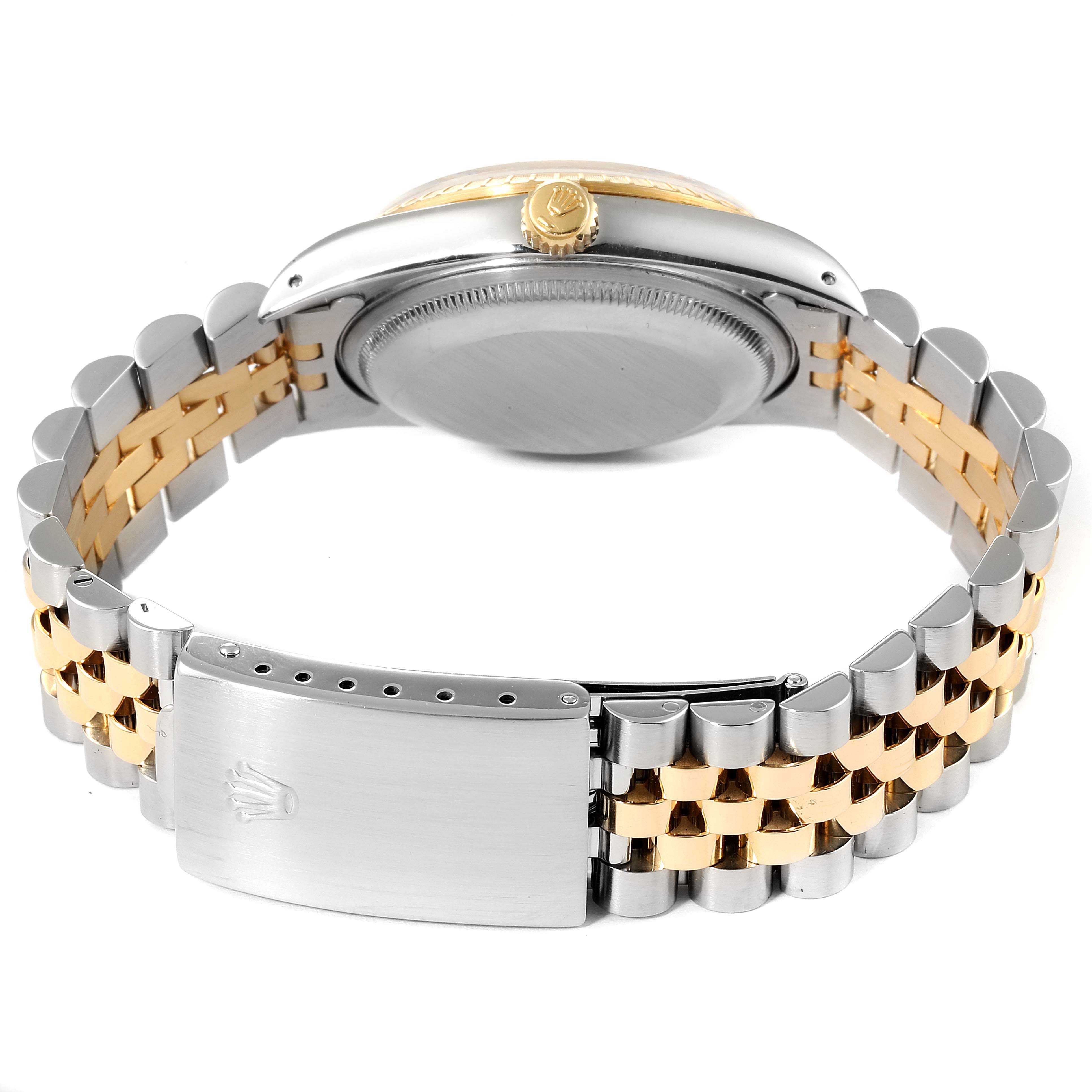 The image shows the side and back of a Rolex Date 15223 Men's Steel and Gold (two tone) Silver Dial 15223 Men's Steel and Gold (two tone) Silver Dial model watch, highlighting the metal case and two-tone bracelet with a clasp.