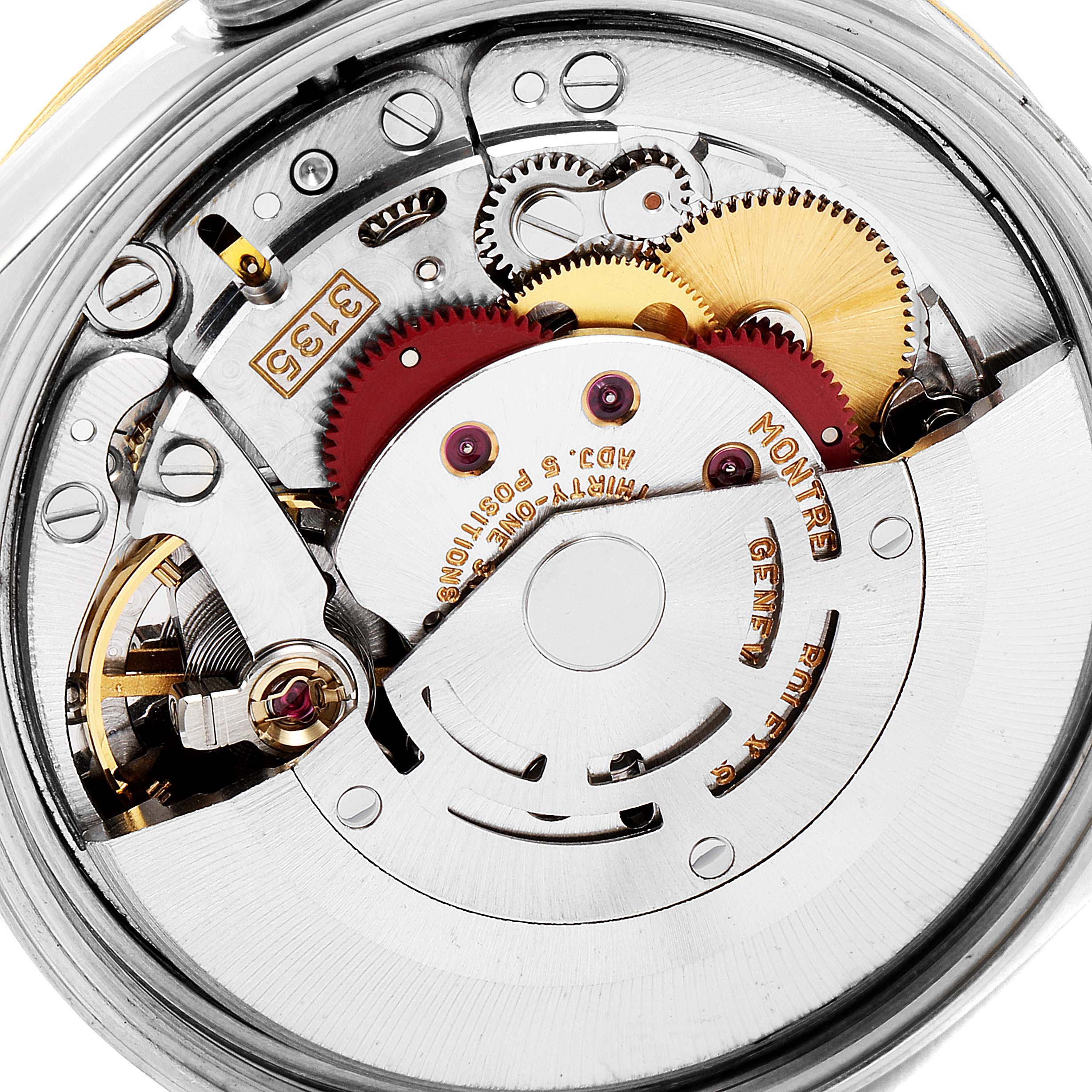 The image shows a close-up view of the movement and internal mechanics of a Rolex Date 15223 Men's Steel and Gold (two tone) Silver Dial 15223 Men's Steel and Gold (two tone) Silver Dial model watch.