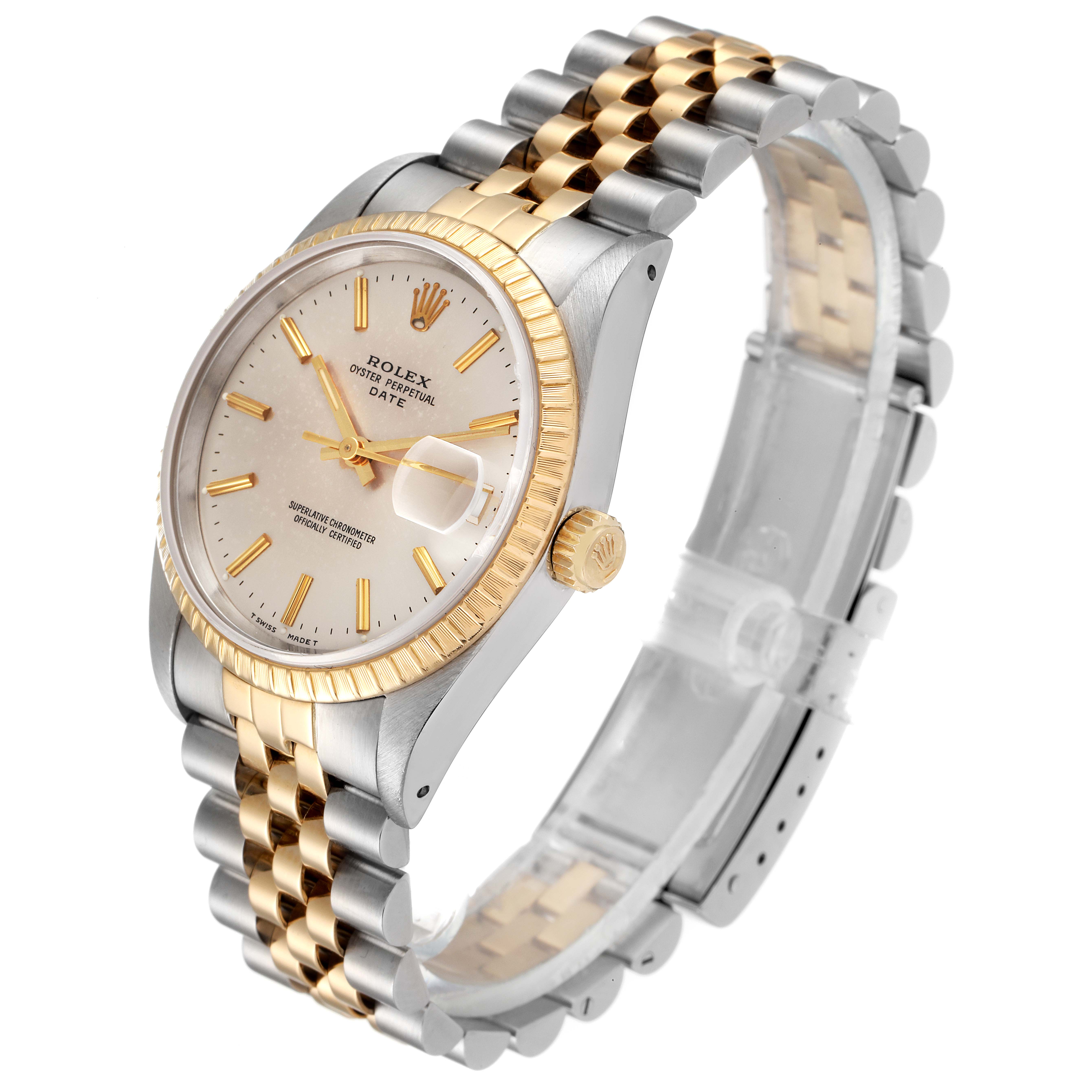The image shows an angled view of a Rolex Date 15223 Men's Steel and Gold (two tone) Silver Dial 15223 Men's Steel and Gold (two tone) Silver Dial watch, highlighting its face, dial, crown, and two-tone bracelet.
