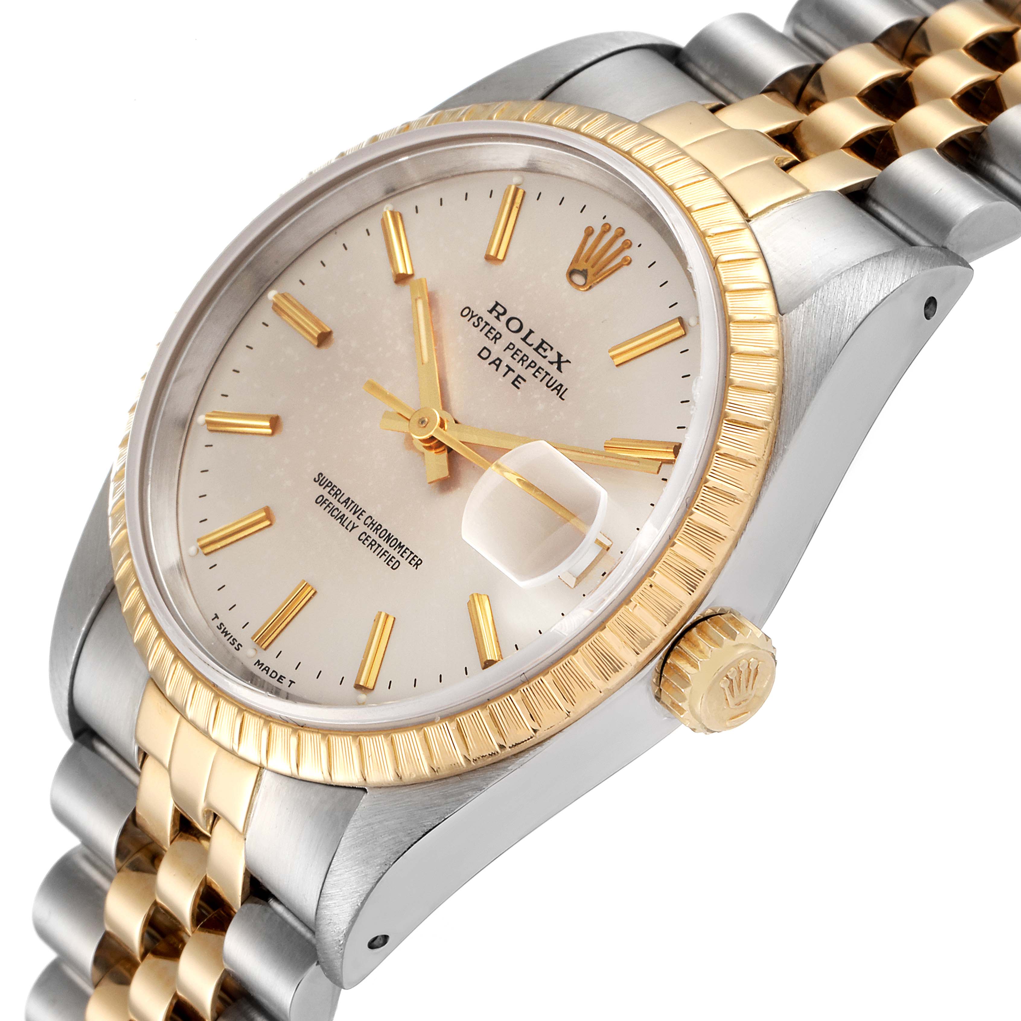 The image shows a side-angle view of a Rolex Date 15223 Men's Steel and Gold (two tone) Silver Dial 15223 Men's Steel and Gold (two tone) Silver Dial model, displaying the dial, fluted bezel, crown, and part of the jubilee bracelet.
