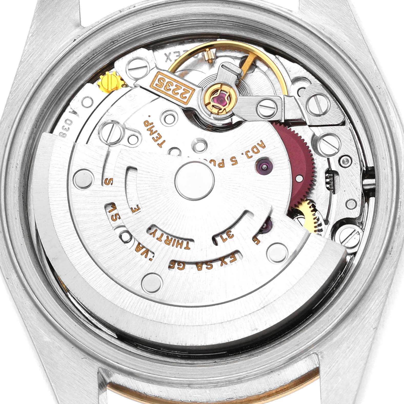 The image shows the movement of a Rolex Datejust 79173 Women's Stainless Steel White Dial watch from a back angle, highlighting its intricate internal components.