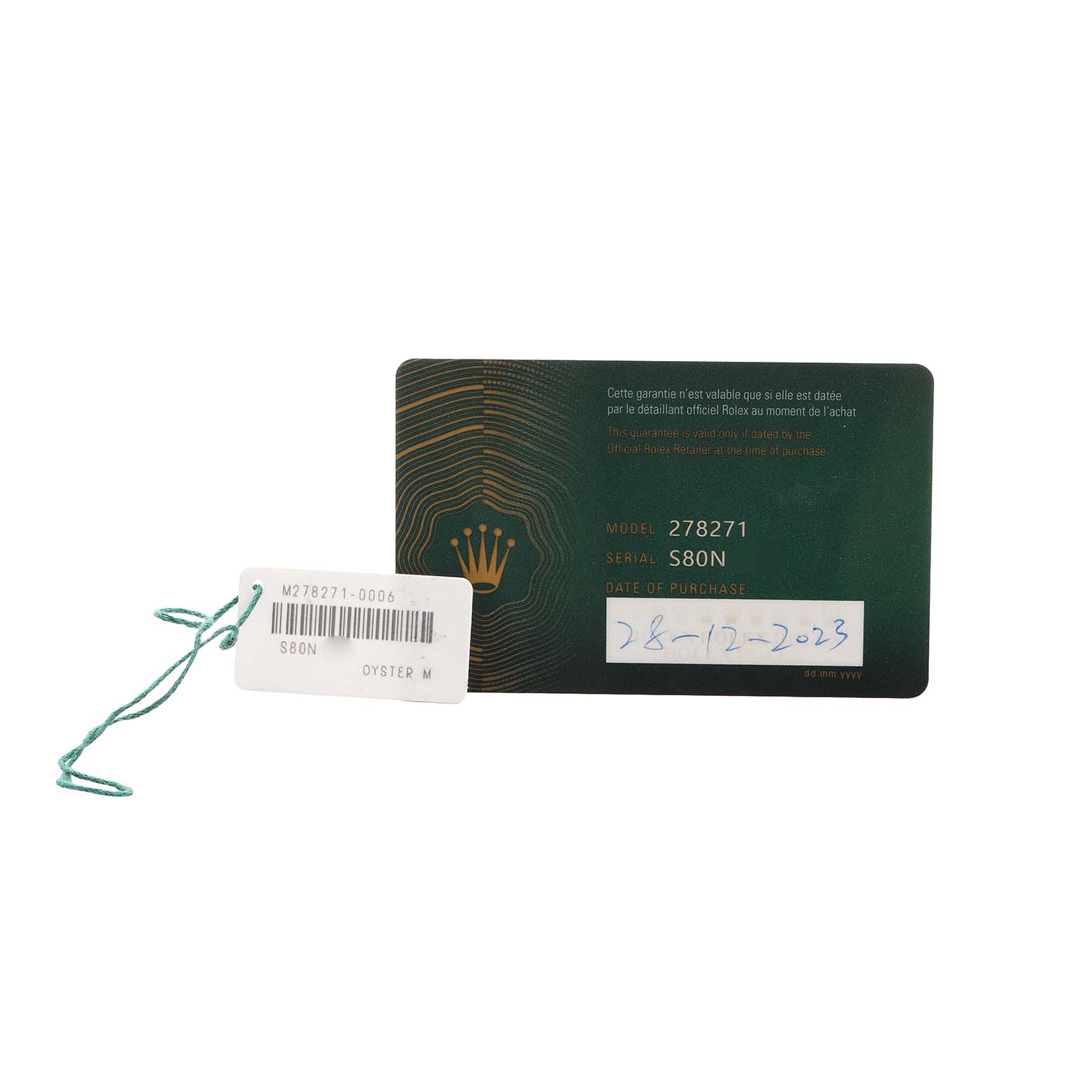 The image shows a Rolex warranty card and a tag for the Mid-Size model, displaying model and serial numbers.