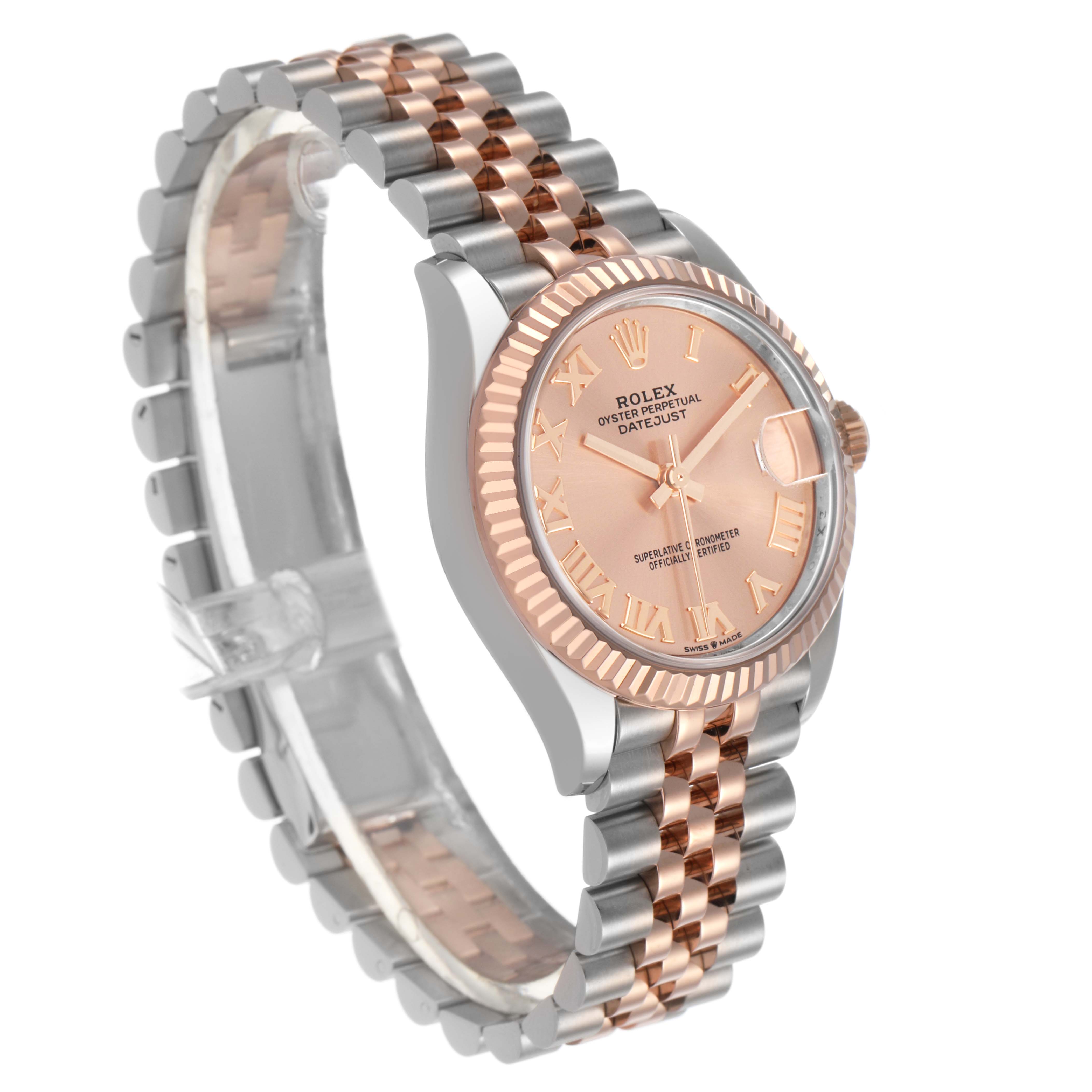The Rolex Mid-Size 278271 Women's Steel and Gold (two tone) Pink Dial model is shown at a three-quarter angle, highlighting the rose gold fluted bezel and two-tone bracelet.