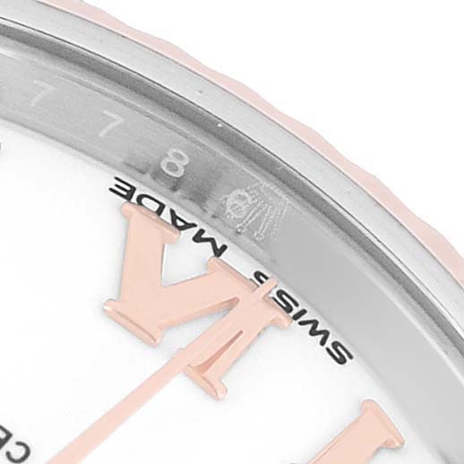 The image shows a close-up of the dial and bezel of a Rolex Mid-Size 178271 Women's Steel and Gold (two tone) White Dial watch, featuring Roman numerals and "Swiss Made" text.