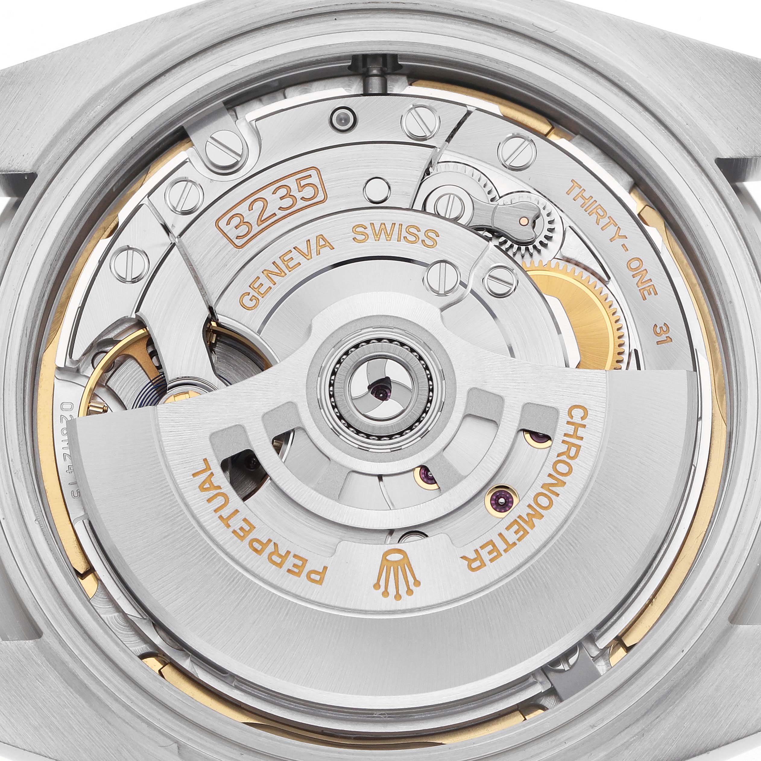 The image shows the movement of the Rolex Datejust 41 126334 Men
s Stainless Steel Grey Dial viewed from the back, highlighting the intricate mechanics and markings.