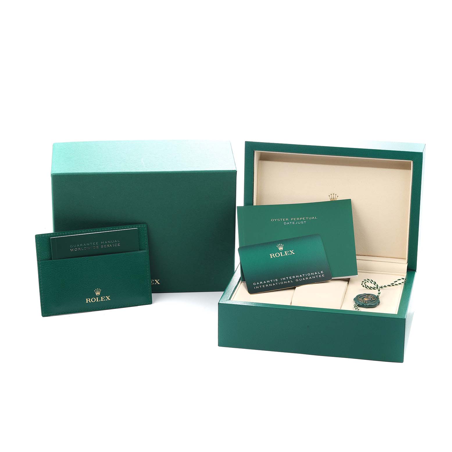 The image shows accessories for the Rolex Datejust 41 126334 Men
s Stainless Steel Grey Dial, including a green box, warranty manual, and certification card.