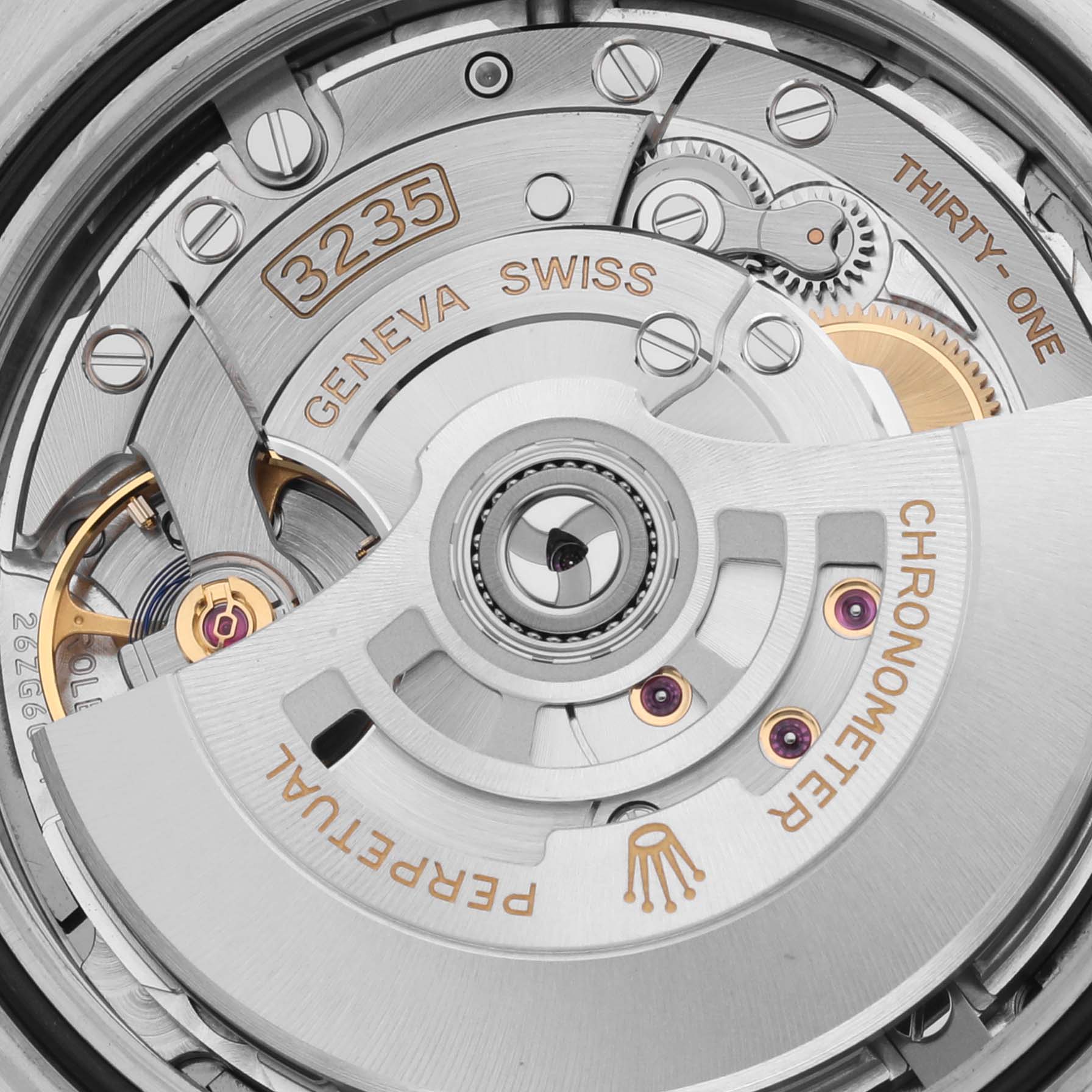 This image shows a close-up view of the movement mechanism of a Rolex Datejust 41 126333 Men's Steel and Gold (two tone) Grey Dial 126333 Men's Steel and Gold (two tone) Grey Dial watch, highlighting the intricate inner components.