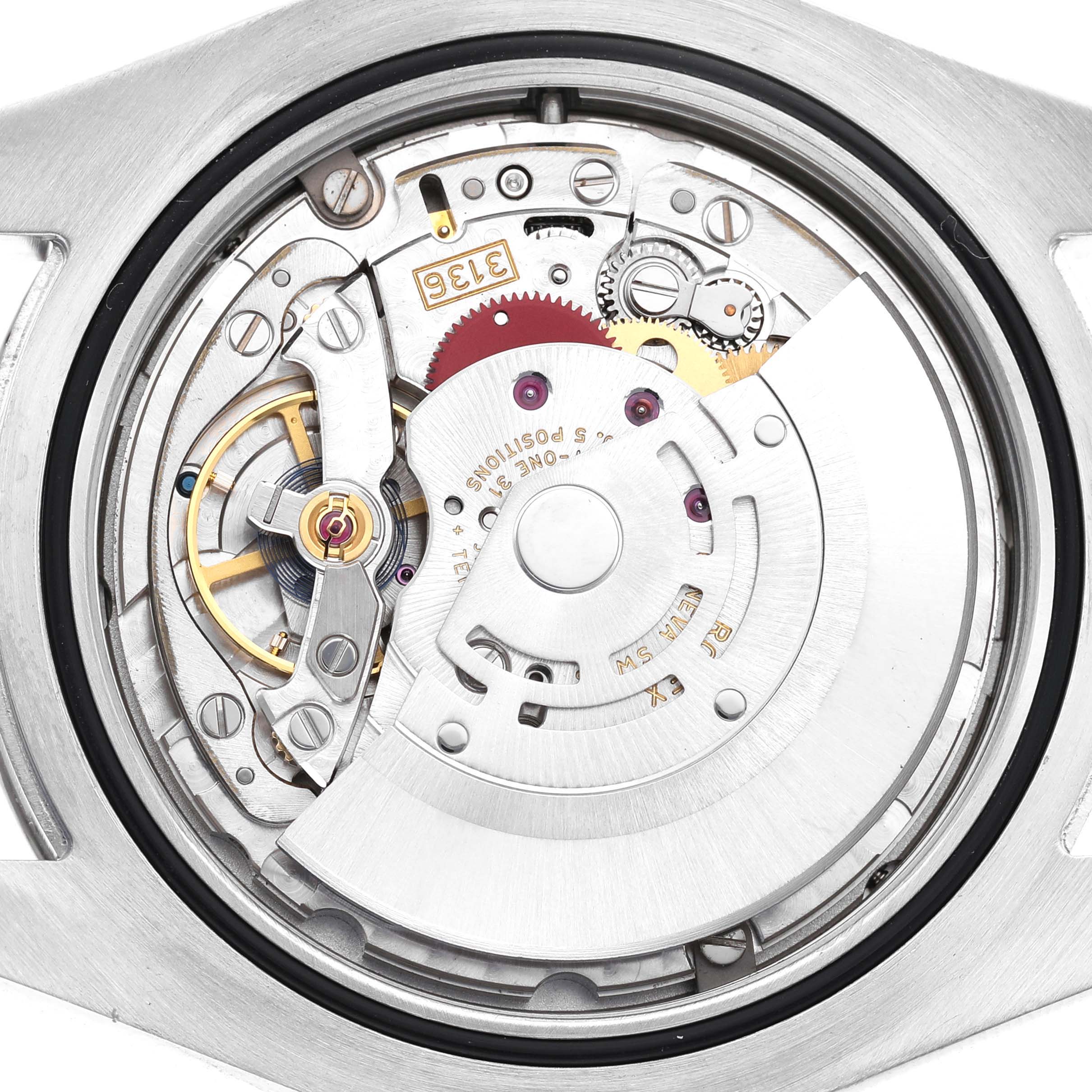 The image shows the Rolex Datejust 41 116334 Men's Stainless Steel Blue Dial watch's movement from a top-down angle, highlighting its intricate mechanics.