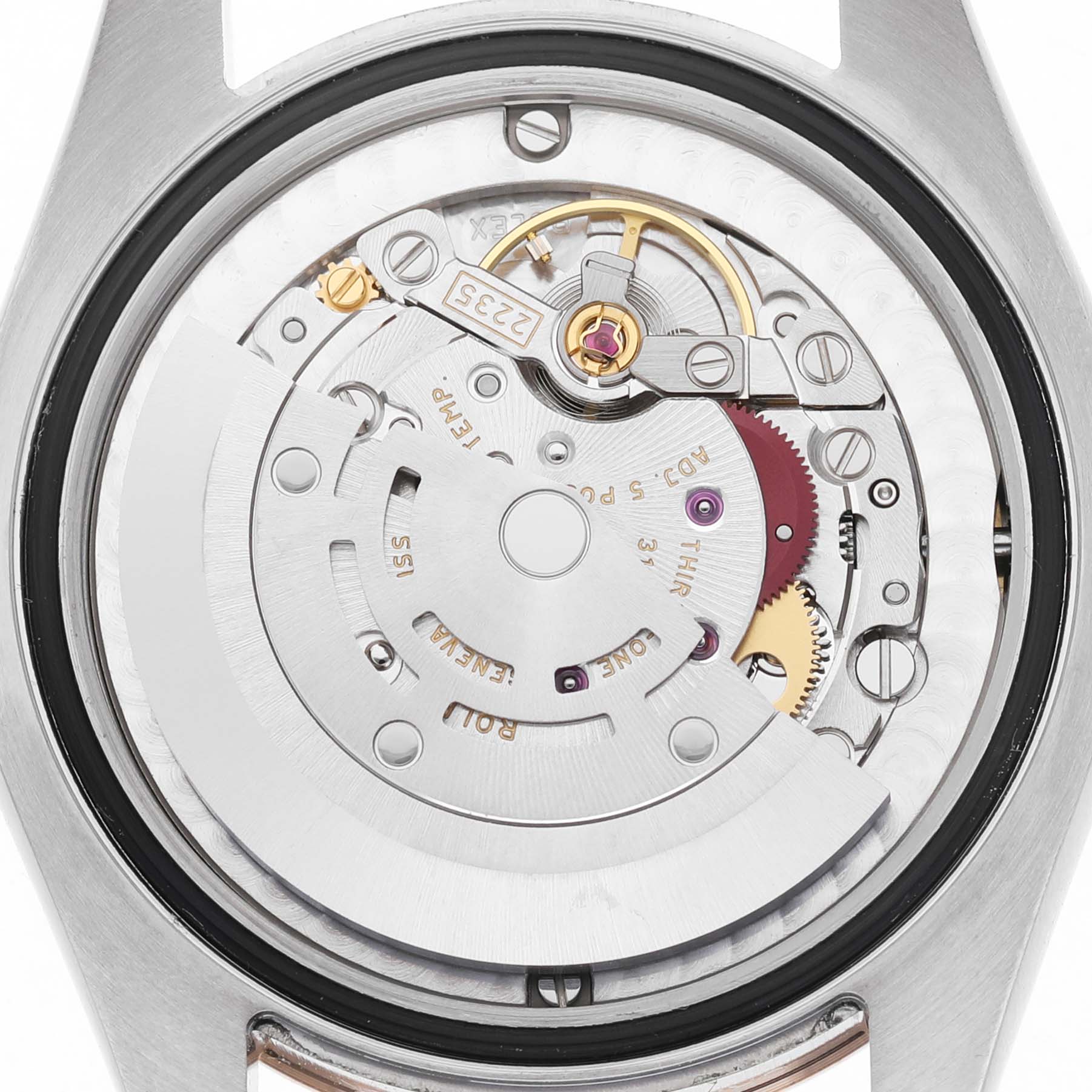 The image shows the movement of a Rolex Mid-Size 178271 Women's Steel and Gold (two tone) Pink Dial model from the back, revealing gears and components.