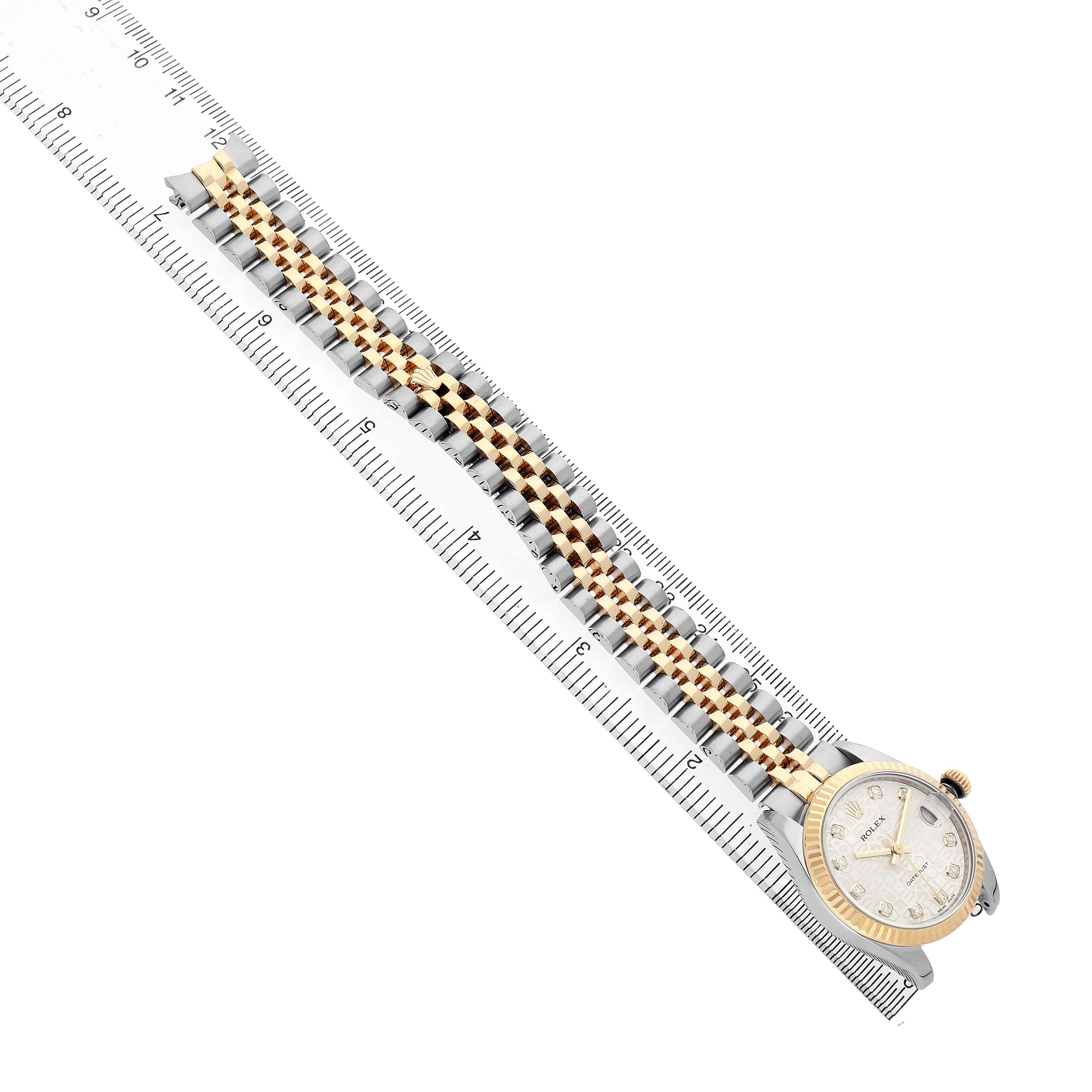 The Rolex Mid-Size 178273 Women's Steel and Gold (two tone) Silver Dial model watch is shown from an overhead angle, featuring the face, case, and full bracelet.