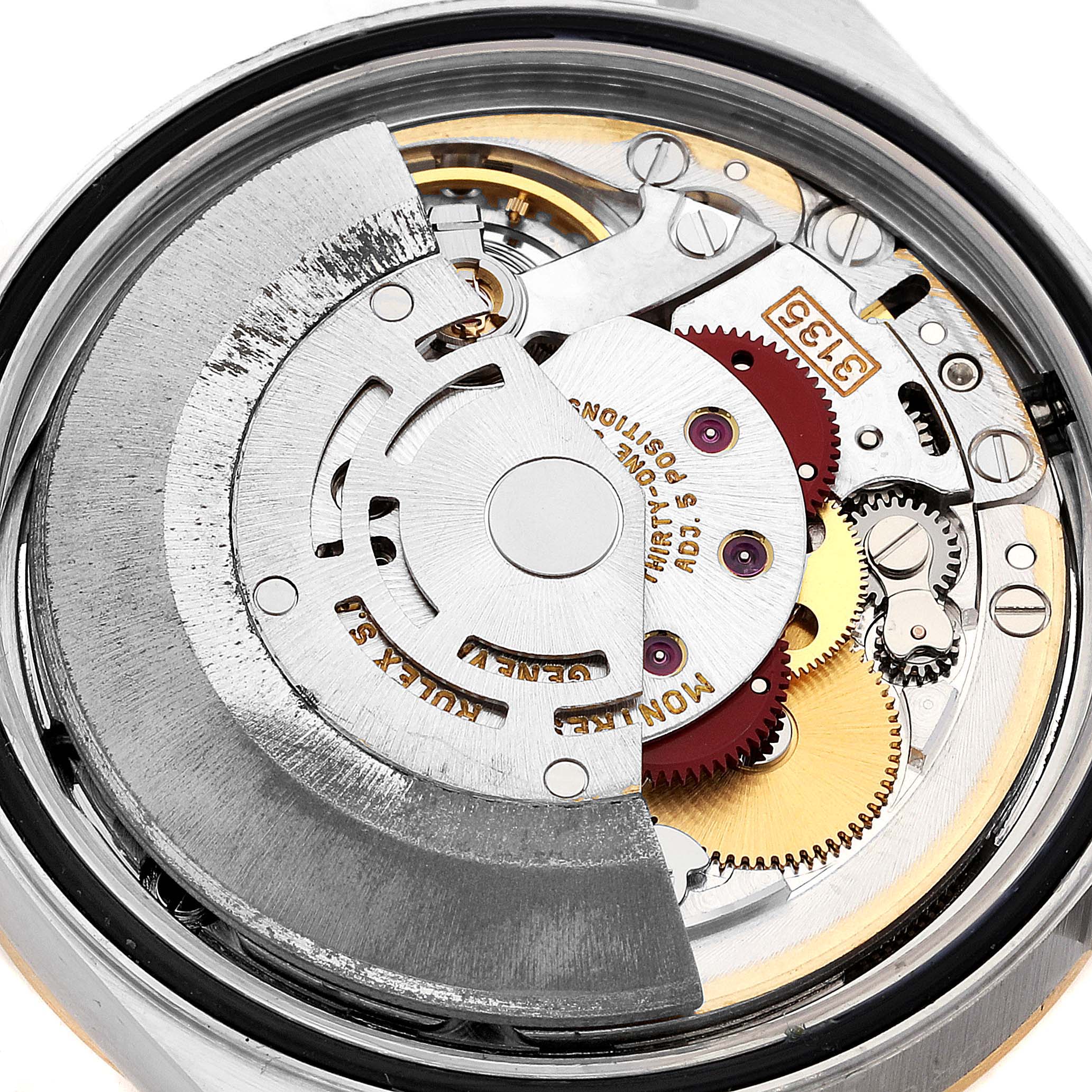 This image shows the internal mechanism of a Rolex Datejust 16233 Men's Steel and Gold (two tone) Black Dial 16233 Men's Steel and Gold (two tone) Black Dial watch at a close-up angle.