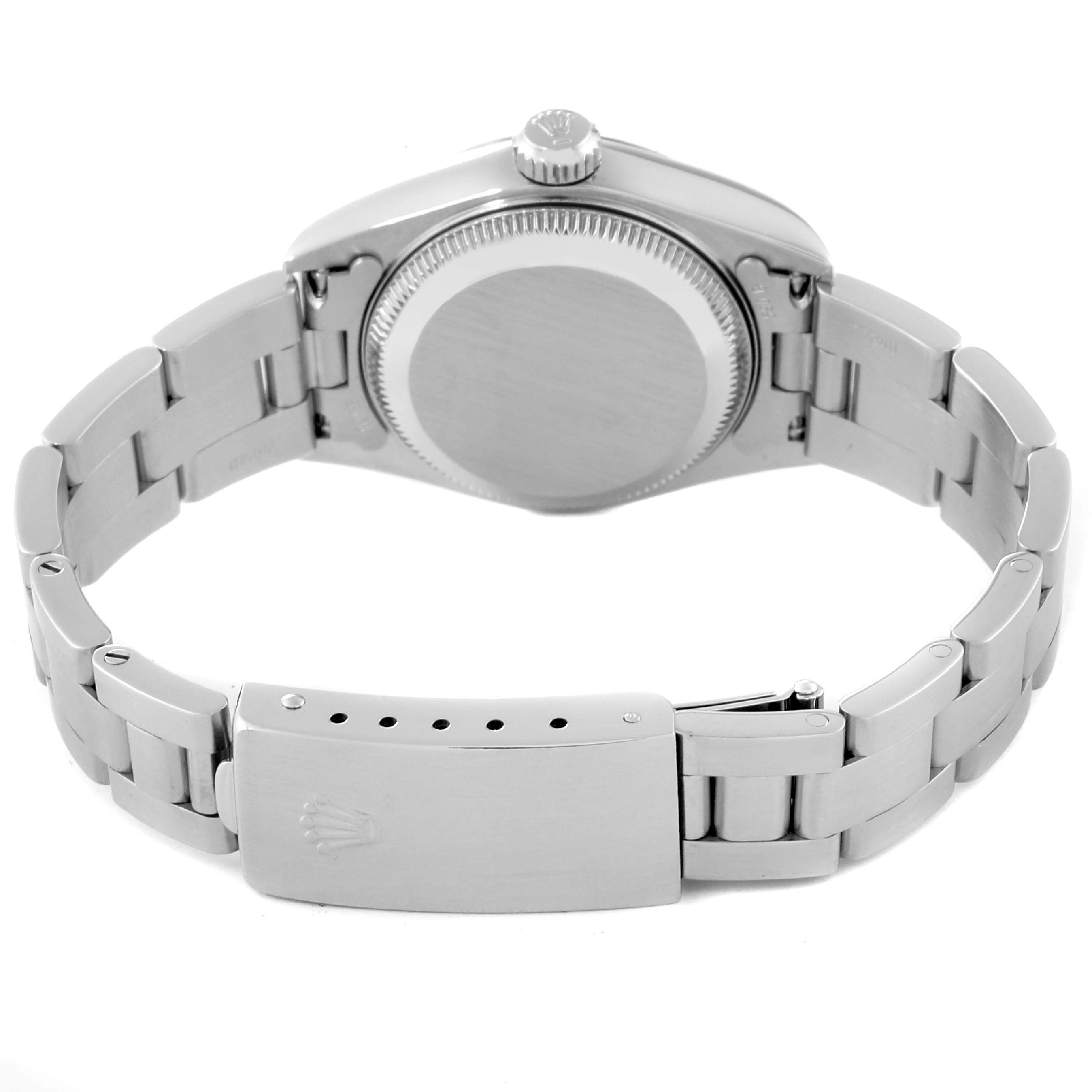 The image shows the back view of a Rolex Datejust 79174 Women's Stainless Steel White Dial 79174 Women's Stainless Steel White Dial watch, focusing on the case back and steel bracelet with a clasp.