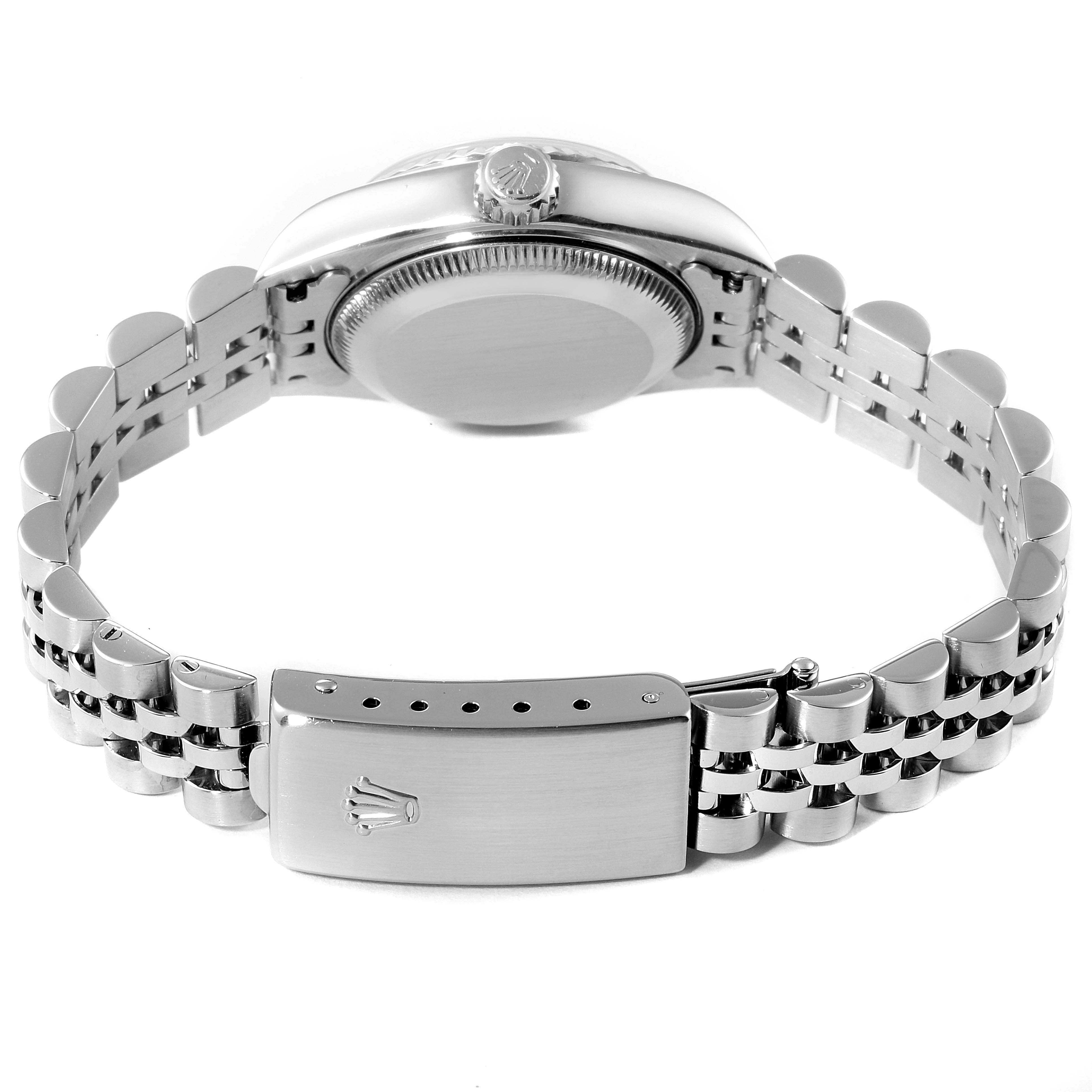 This image shows the Rolex Datejust 79174 Women
s Stainless Steel Silver Dial 79174 Women
s Stainless Steel Silver Dial watch from the back, highlighting its caseback and bracelet clasp.