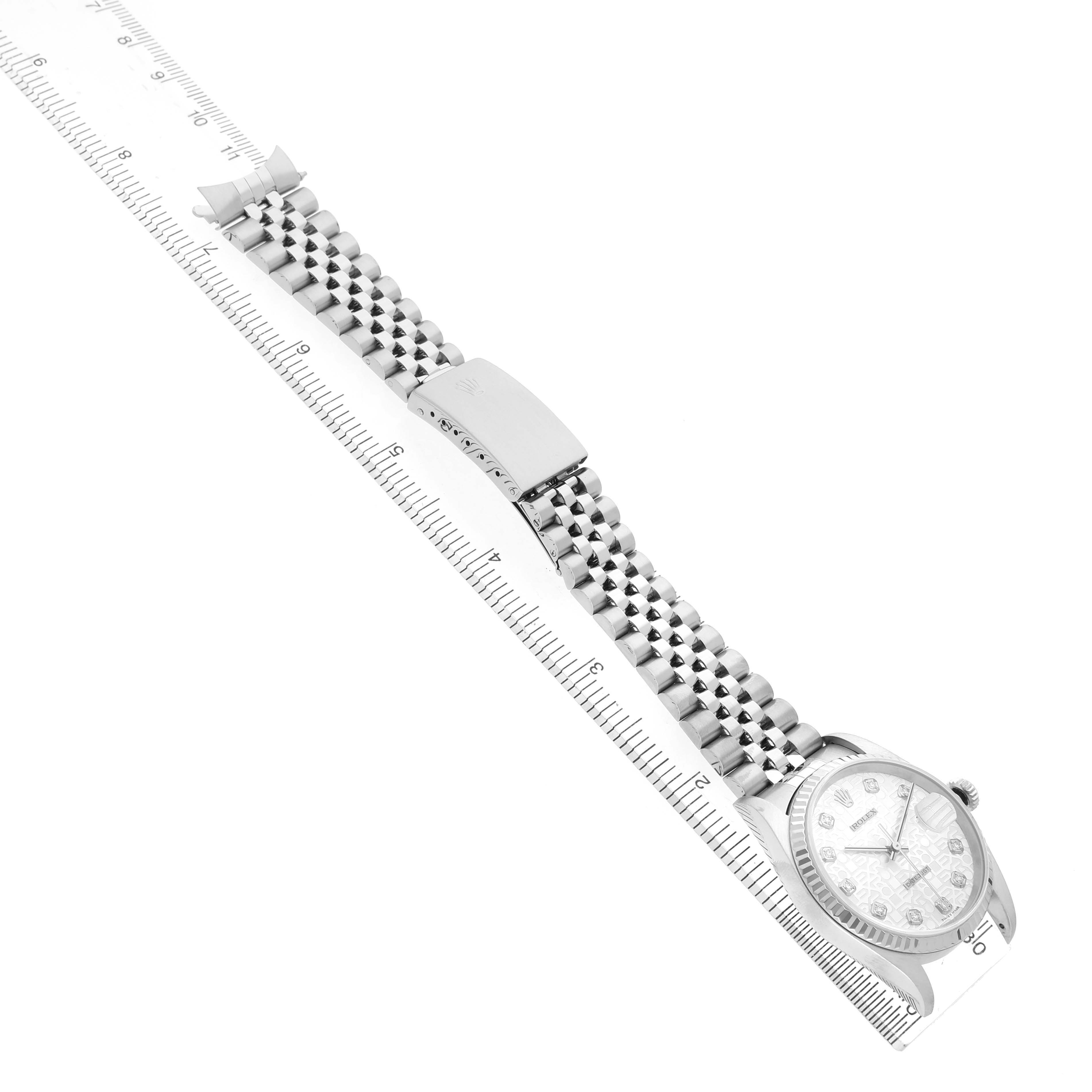 The Rolex Datejust 16234 Men's Stainless Steel Silver Dial watch is shown at a slight diagonal angle, highlighting the bracelet, clasp, and a view of the dial.