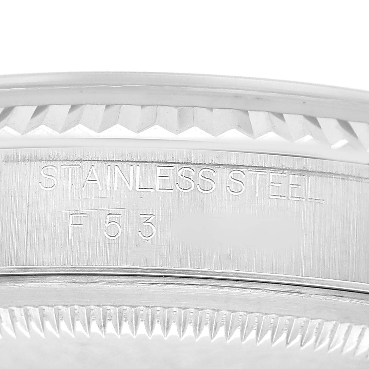 This image shows a close-up of the case side of a stainless steel Rolex Datejust 16234 Men's Stainless Steel Silver Dial, highlighting the model engraving.