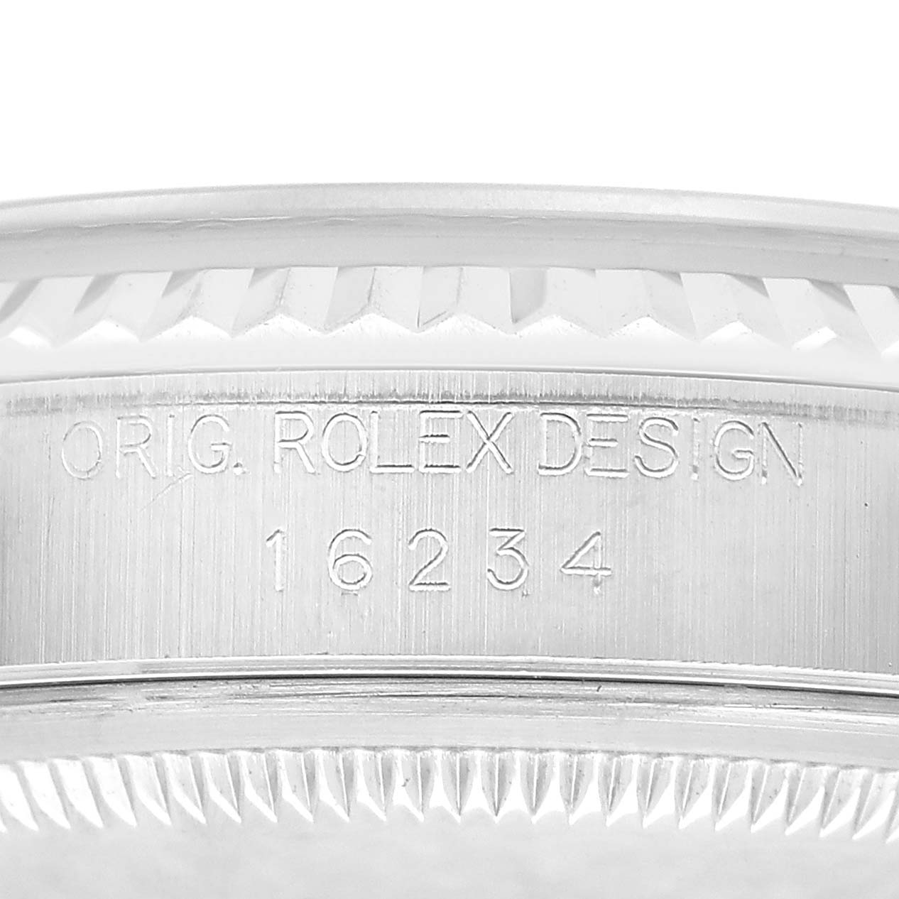 The image shows an engraved side view of the Rolex Datejust 16234 Men's Stainless Steel Silver Dial bezel and case edge.
