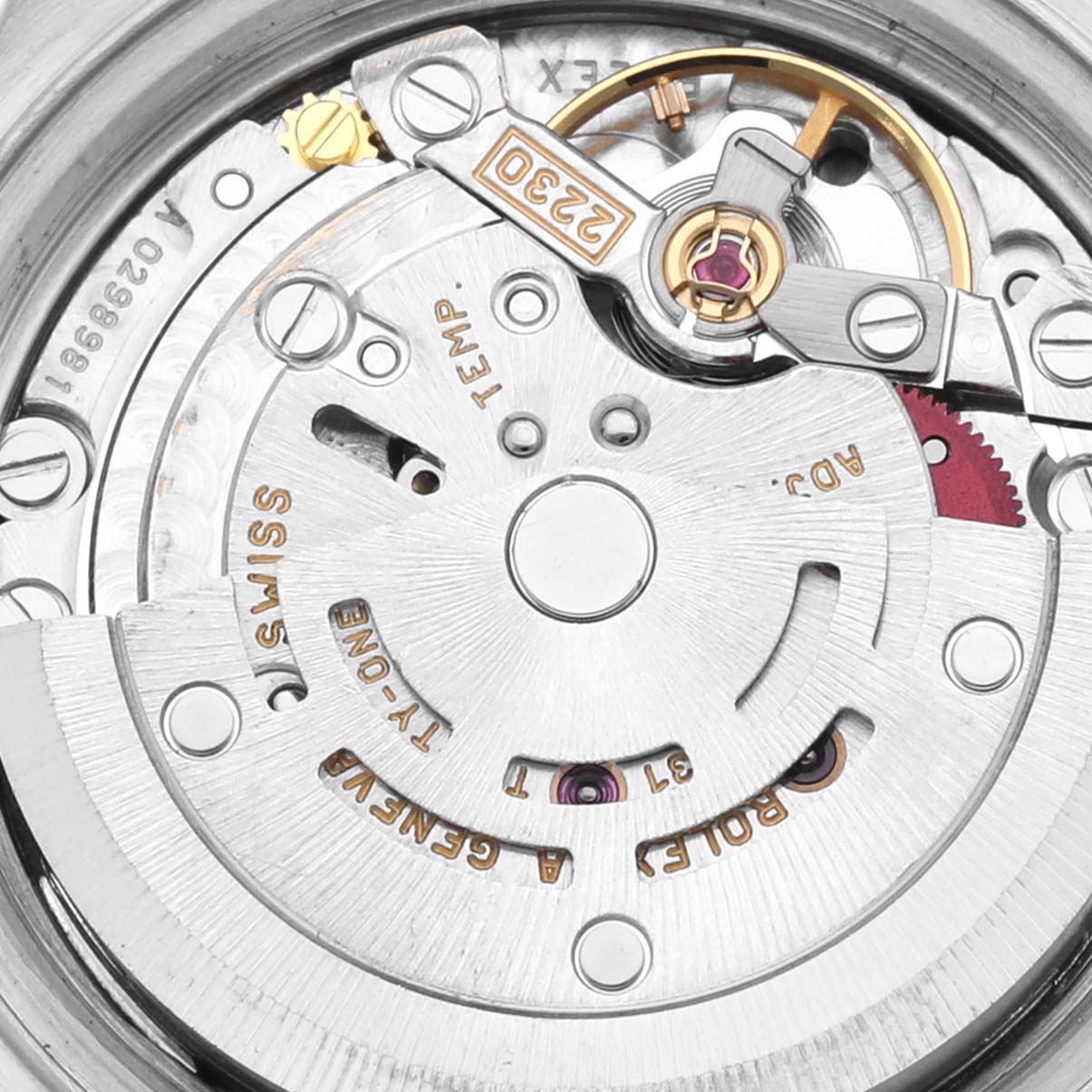 This image shows a close-up view of the Rolex Datejust 79173 Women's Steel and Gold (two tone) Champagne Dial 79173 Women's Steel and Gold (two tone) Champagne Dial movement mechanism, highlighting the rotor and intricate inner gears.