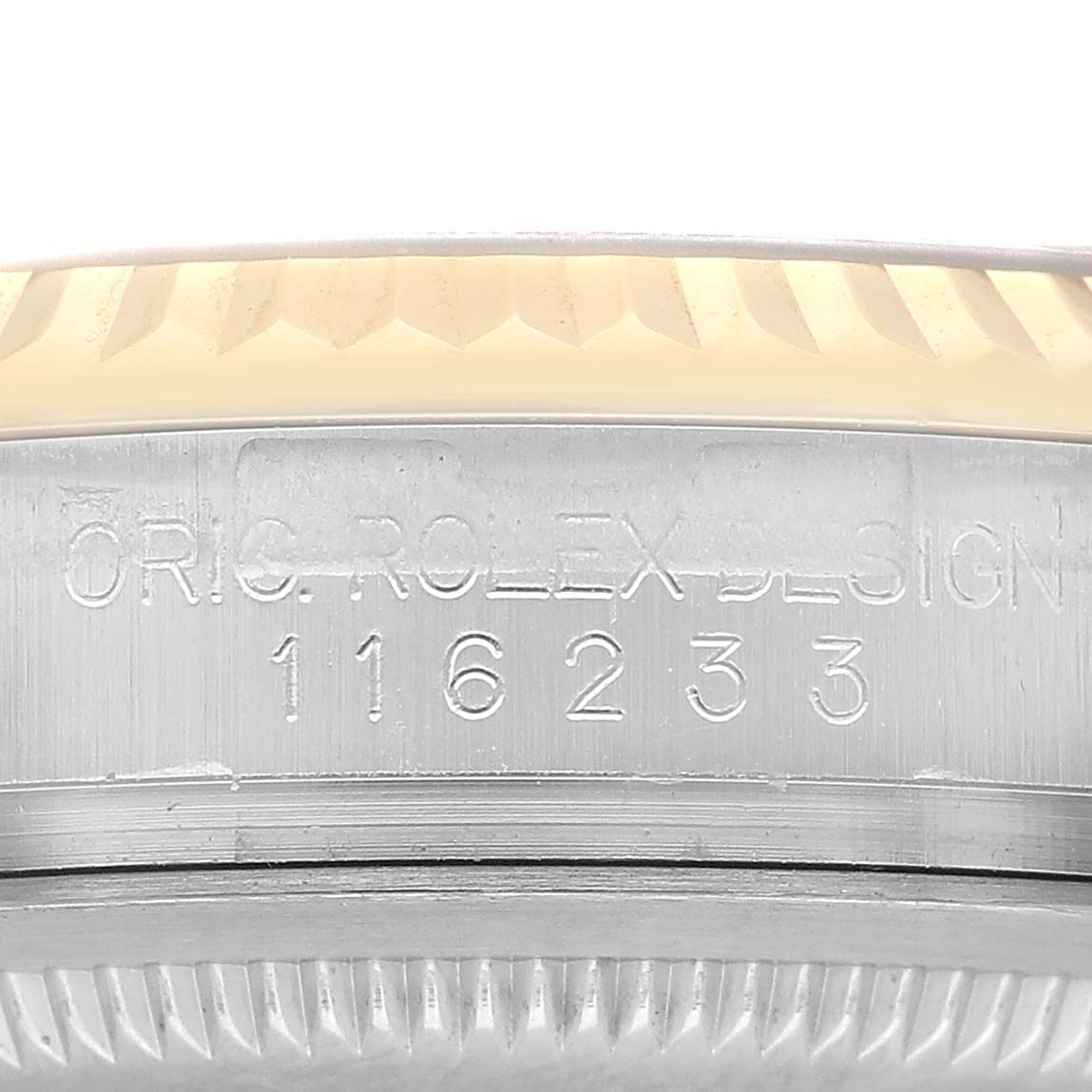 The image shows the side of the Rolex Datejust 116233 Men's Stainless Steel Black Dial watch, highlighting the engraved model number on the case.