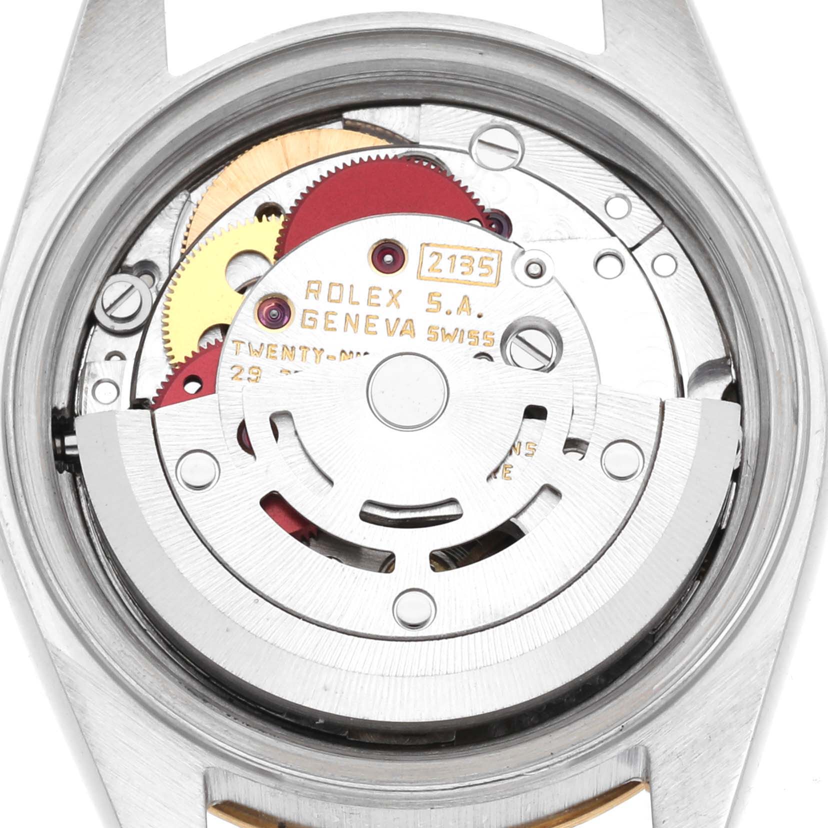 This image shows the internal movement mechanism of the Rolex Datejust 69173 Women's Steel and Gold (two tone) Champagne Dial 69173 Women's Steel and Gold (two tone) Champagne Dial watch model from the back view, highlighting gears and engravings.