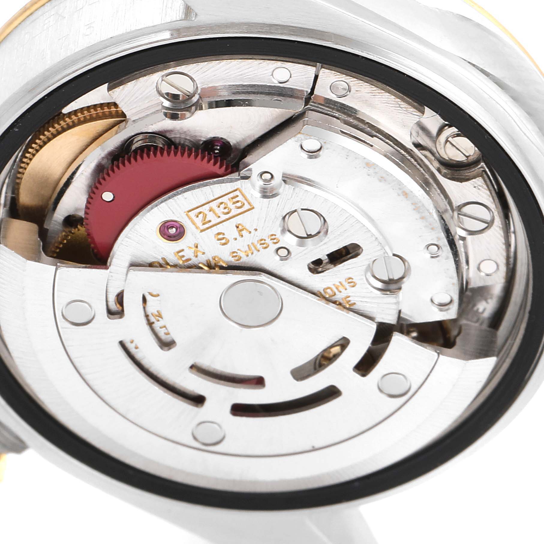 This close-up image shows the internal movement mechanism of a Rolex Datejust 69173 Women
s Steel and Gold (two tone) Beige Dial 69173 Women
s Steel and Gold (two tone) Beige Dial watch.
