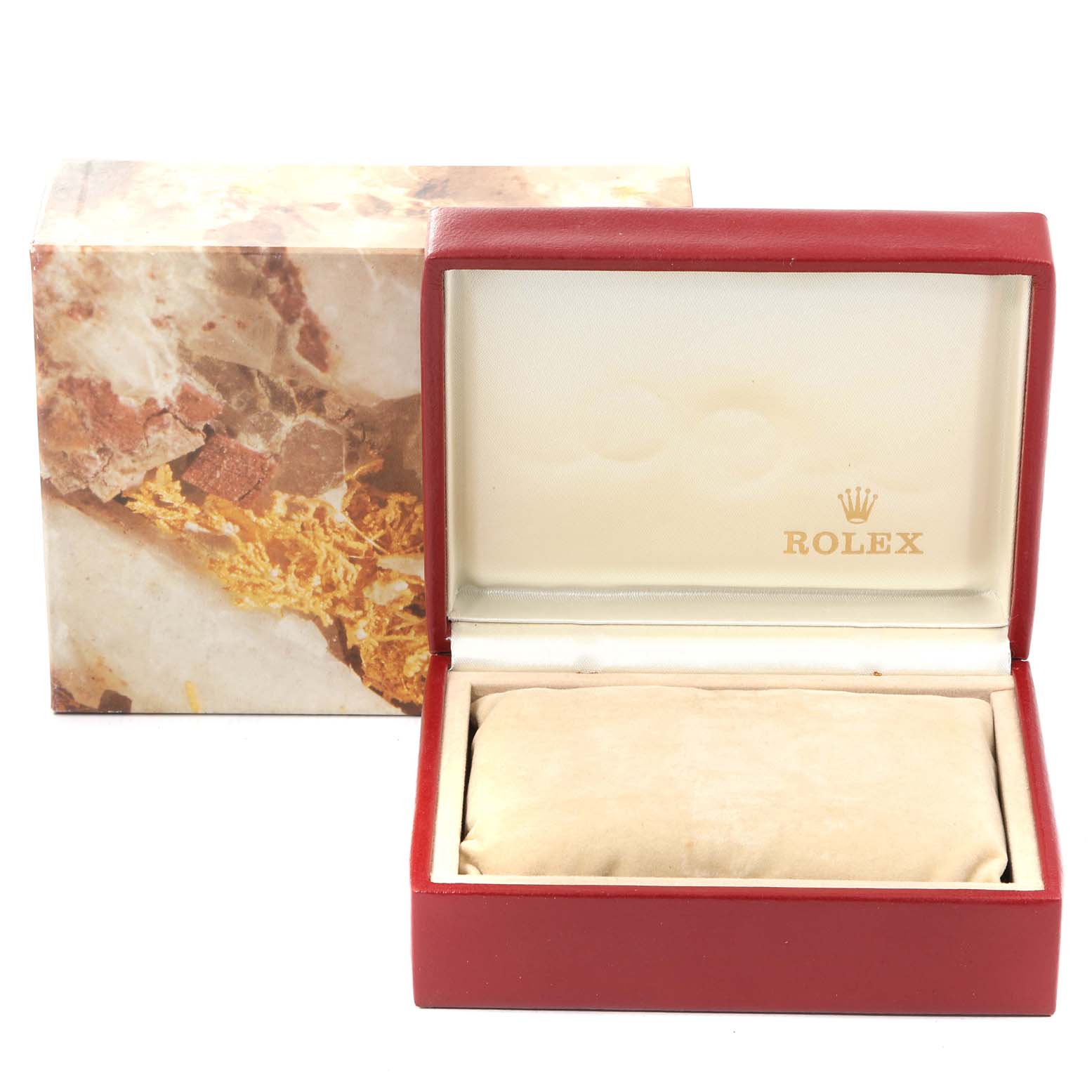 The image shows an open Rolex Datejust 69173 Women
s Steel and Gold (two tone) Beige Dial 69173 Women
s Steel and Gold (two tone) Beige Dial watch box with a cushion inside and its outer marbled packaging.