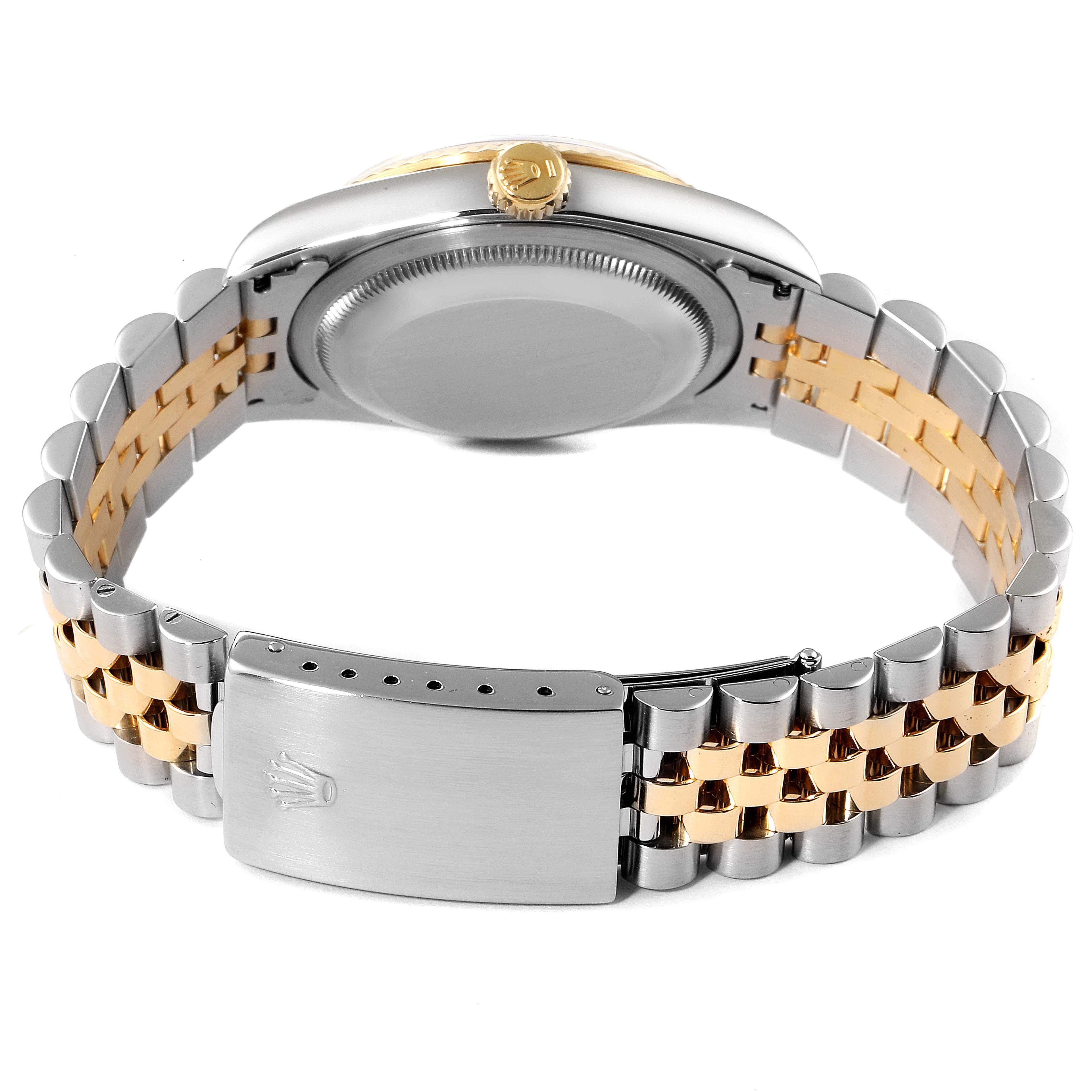 This image shows the back view of a Rolex Datejust 16233 Men's Steel and Gold (two tone) Mother of Pearl Dial 16233 Men's Steel and Gold (two tone) Mother of Pearl Dial watch, highlighting its two-tone bracelet and clasp.