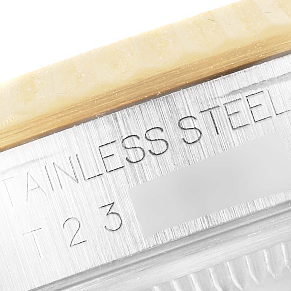 This close-up image shows the stainless steel part with inscriptions of the Rolex Datejust 16233 Men's Steel and Gold (two tone) Mother of Pearl Dial 16233 Men's Steel and Gold (two tone) Mother of Pearl Dial watch.