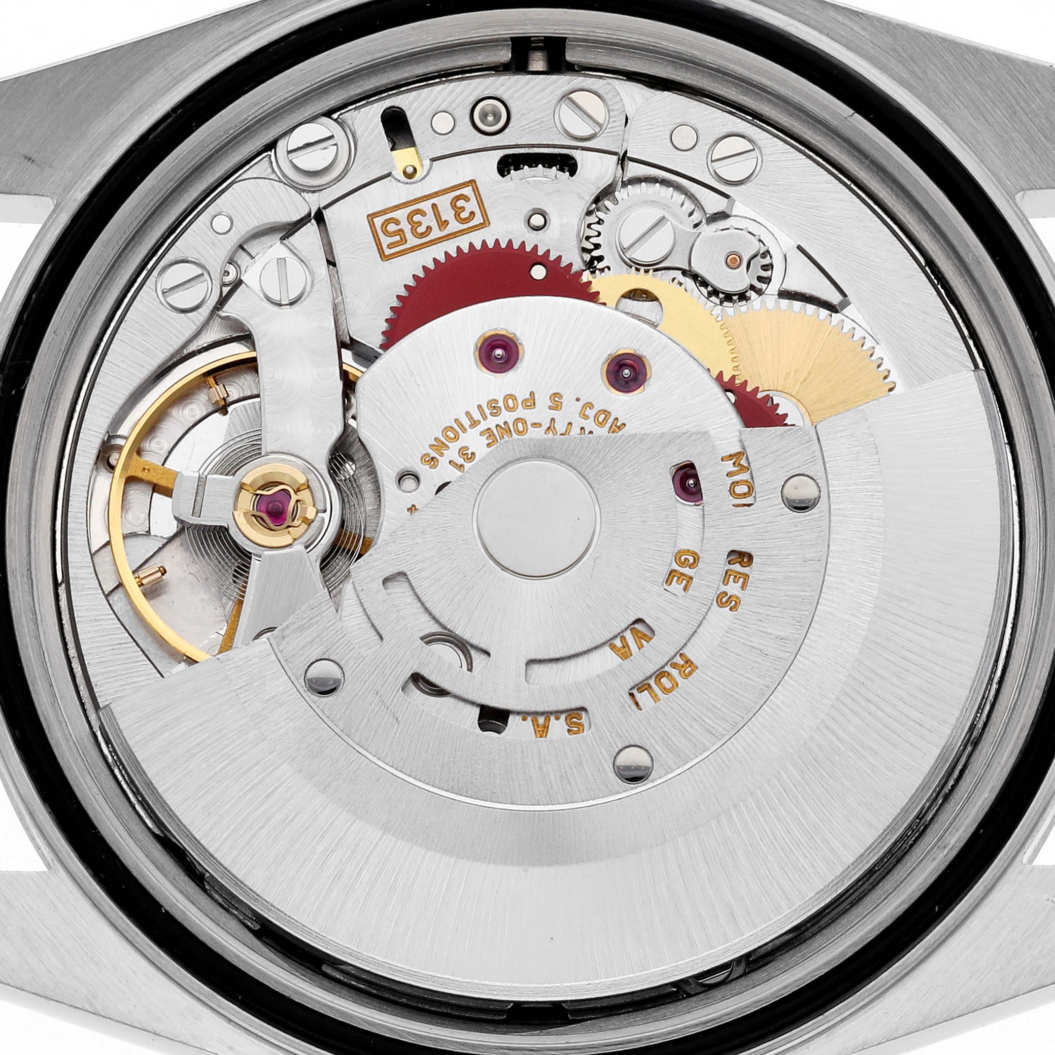 This image shows a close-up view of the movement mechanism of a Rolex Datejust 16233 Men's Steel and Gold (two tone) White Dial 16233 Men's Steel and Gold (two tone) White Dial watch.