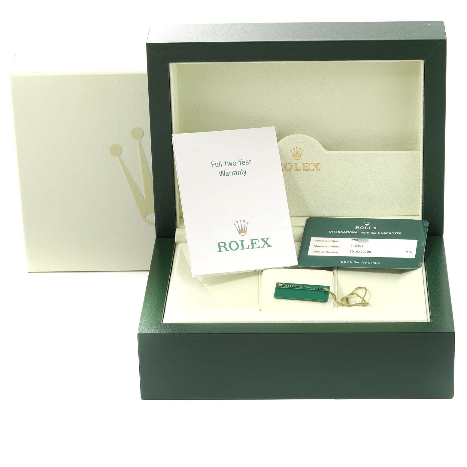 The image shows the open box for a Rolex President 118206 Men's Platinum Silver Dial 118206 Men's Platinum Silver Dial model with warranty booklets, card, and a green tag.
