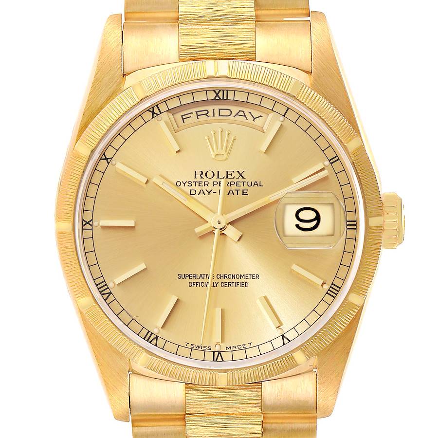 This image shows the face, bezel, and part of the bracelet of a Rolex President Day-Date model watch, highlighting the day and date.