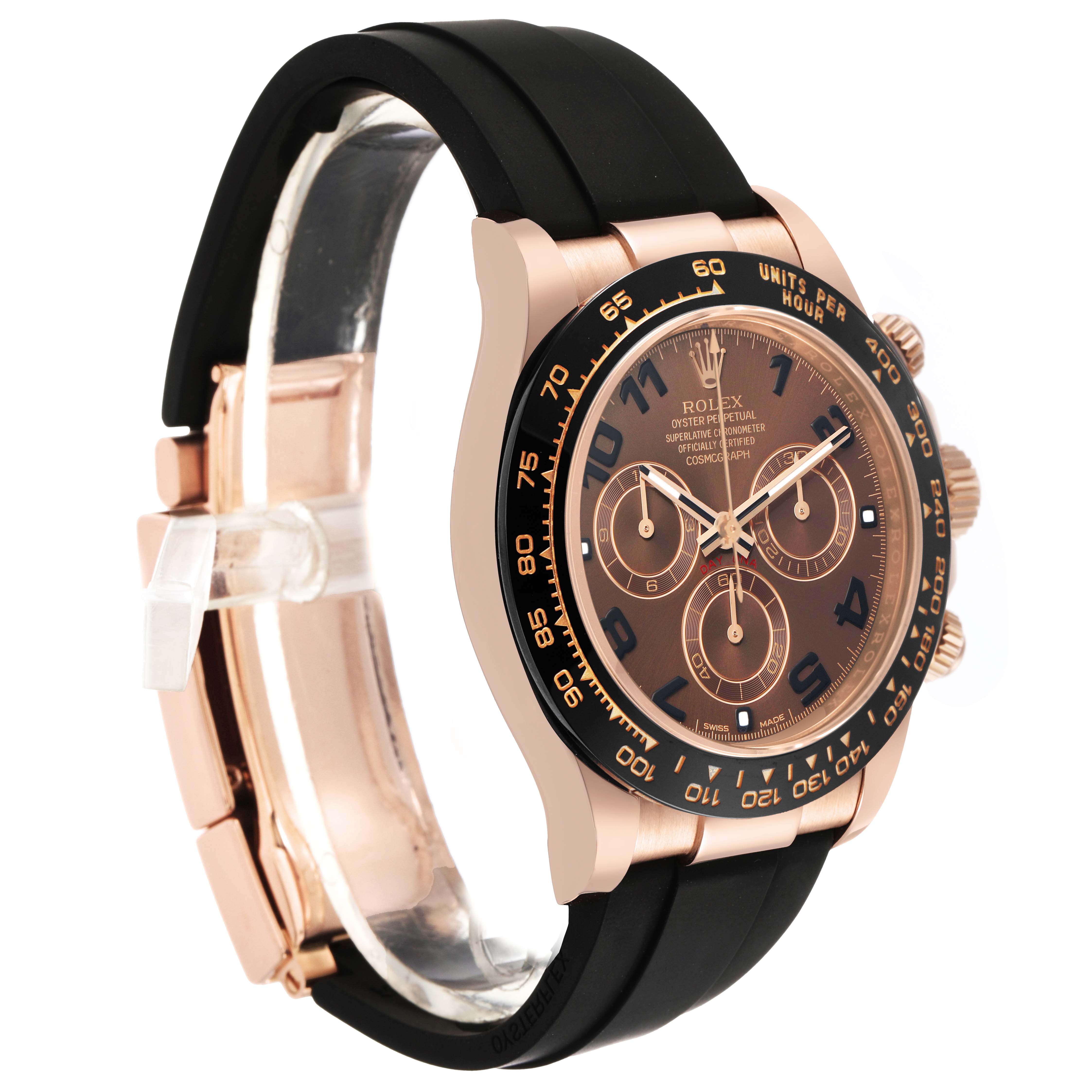 The Rolex Daytona 116515 Men's Rose Gold Brown Dial watch is shown at an angled side view, highlighting the bezel, face, and rubber strap.