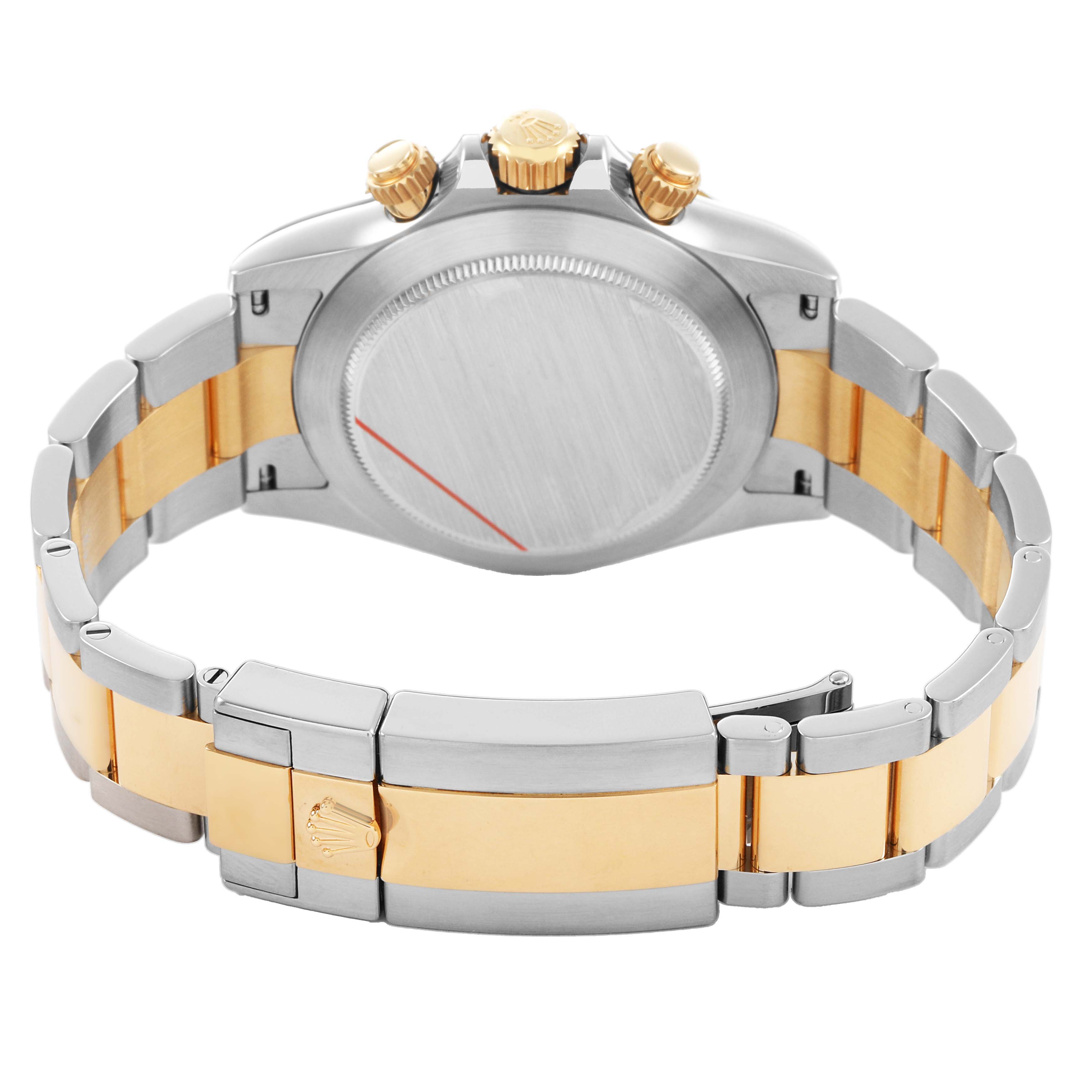 The image shows the back and clasp of a Rolex Daytona 116503 Men's Steel and Gold (two tone) White Dial, highlighting its two-tone metal bracelet and push buttons.