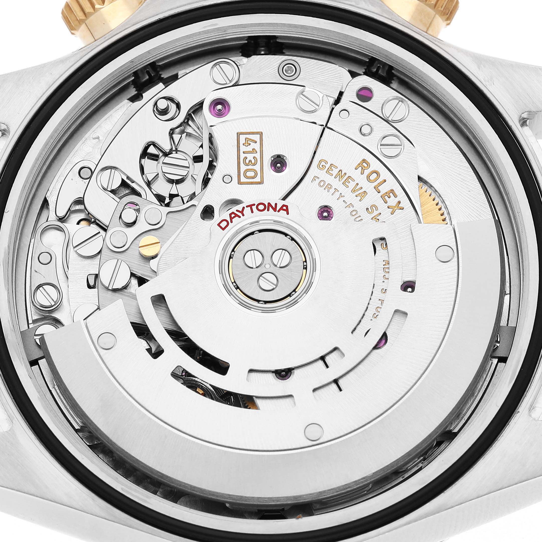 The image shows the movement of a Rolex Daytona 116503 Men's Steel and Gold (two tone) White Dial watch viewed from the back, highlighting its internal mechanics and engravings.