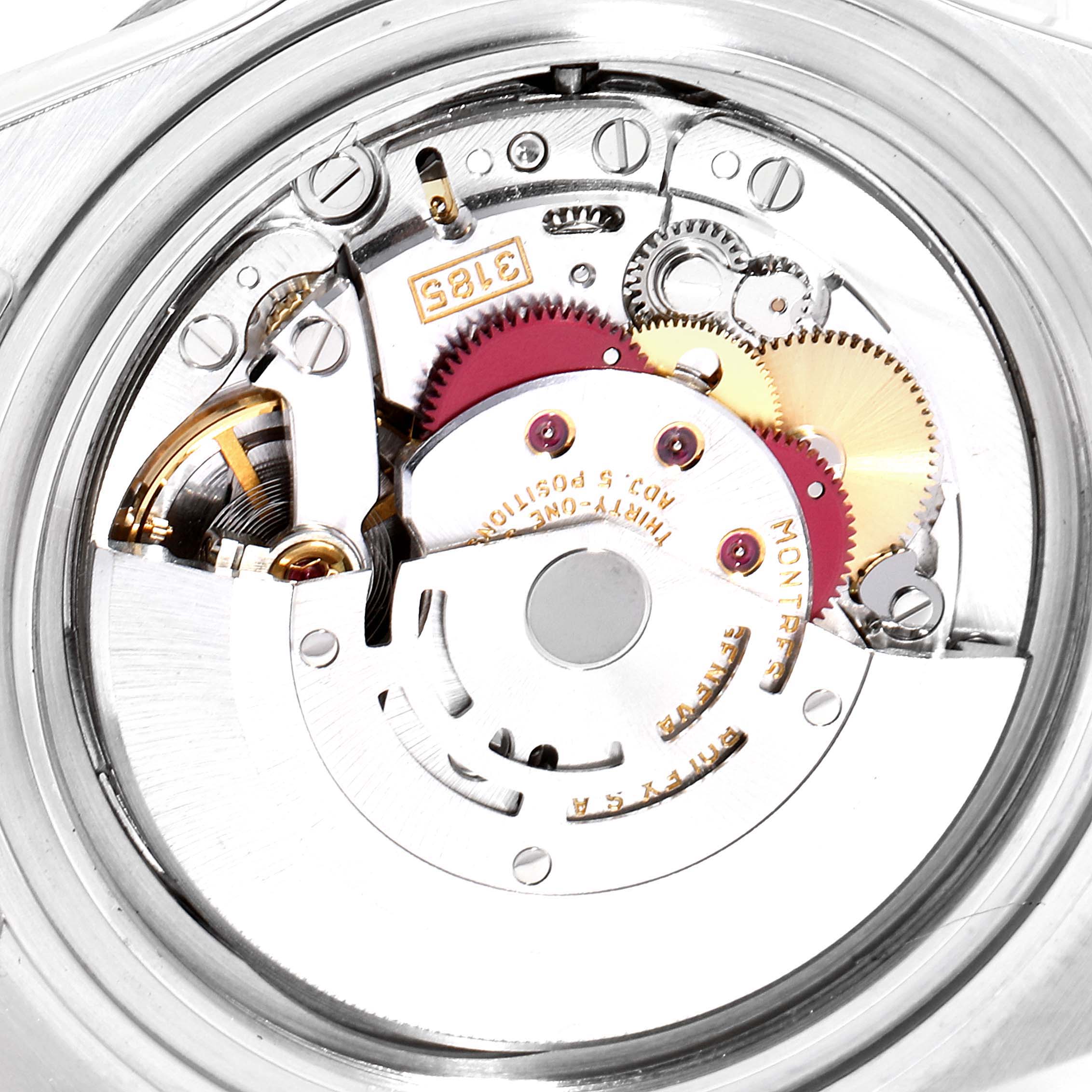 This image shows a close-up view of the internal mechanism of a Rolex Explorer 16570 Men
s Stainless Steel Black Dial 16570 Men
s Stainless Steel Black Dial watch, highlighting gears and movement parts.