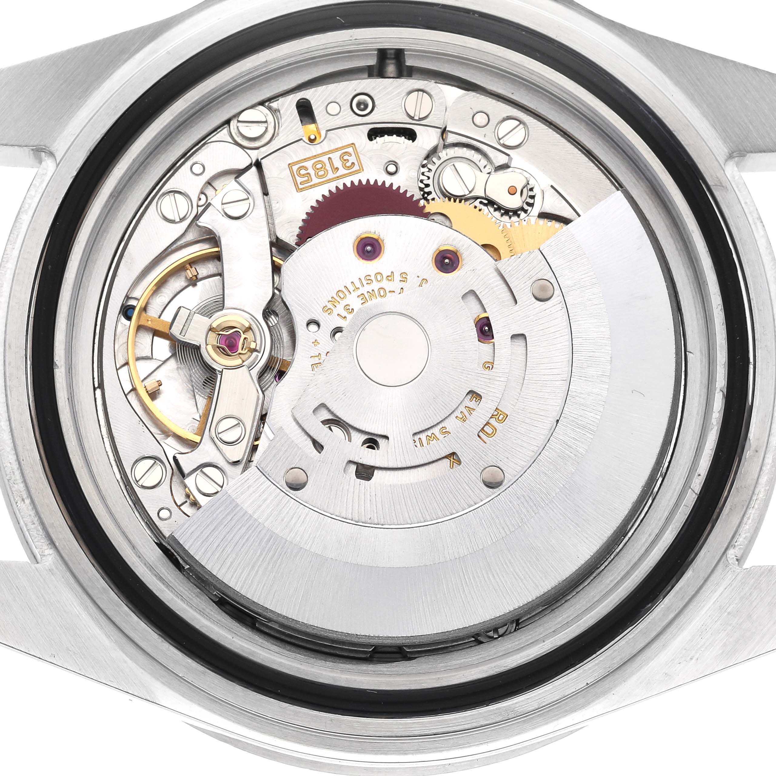 The image shows the intricate inner movement of a Rolex Explorer 16570 Men's Stainless Steel Black Dial 16570 Men's Stainless Steel Black Dial watch, viewed from the back with its case opened.