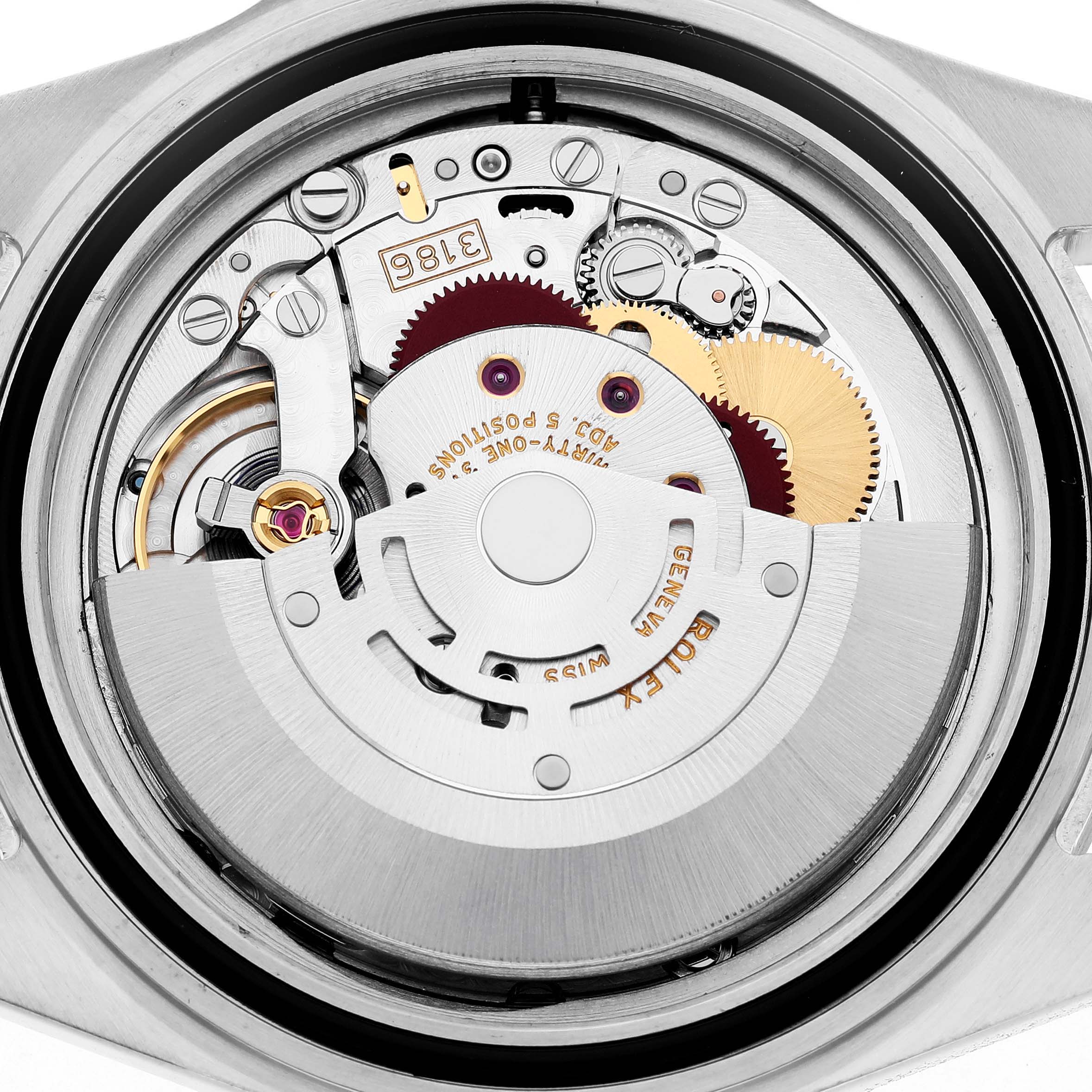 The image shows the back view of the Rolex Explorer 16570 Men's Stainless Steel White Dial watch, highlighting its movement and internal mechanical parts.