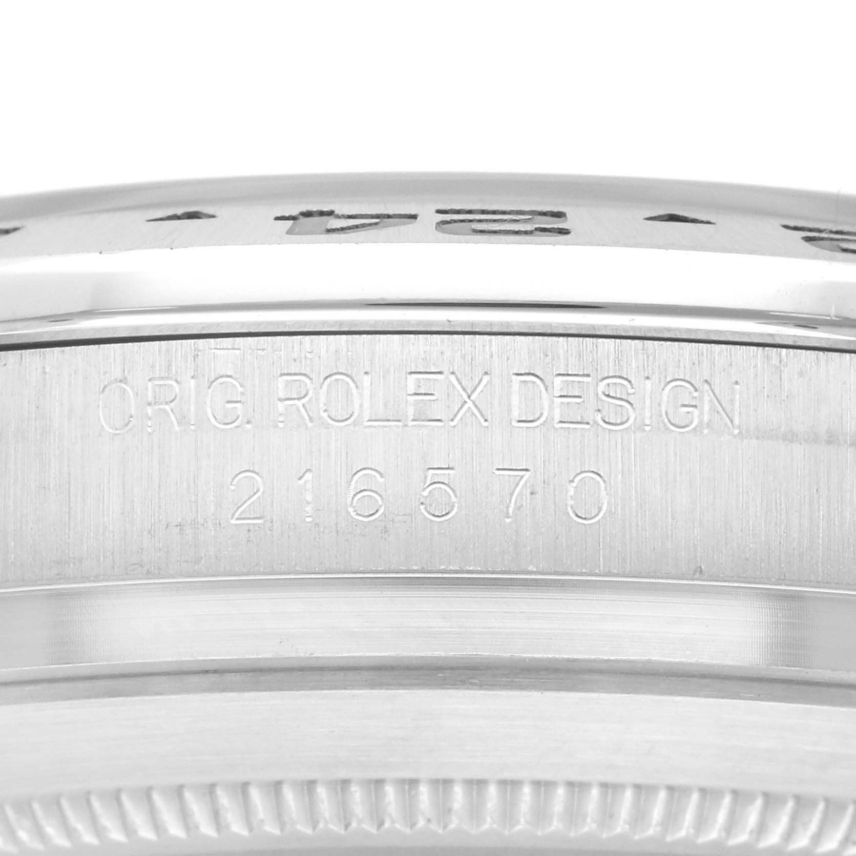 The image shows the engraving on the side of the bezel and case back of a Rolex Explorer 216570 Men's Stainless Steel White Dial 216570 Men's Stainless Steel White Dial watch.