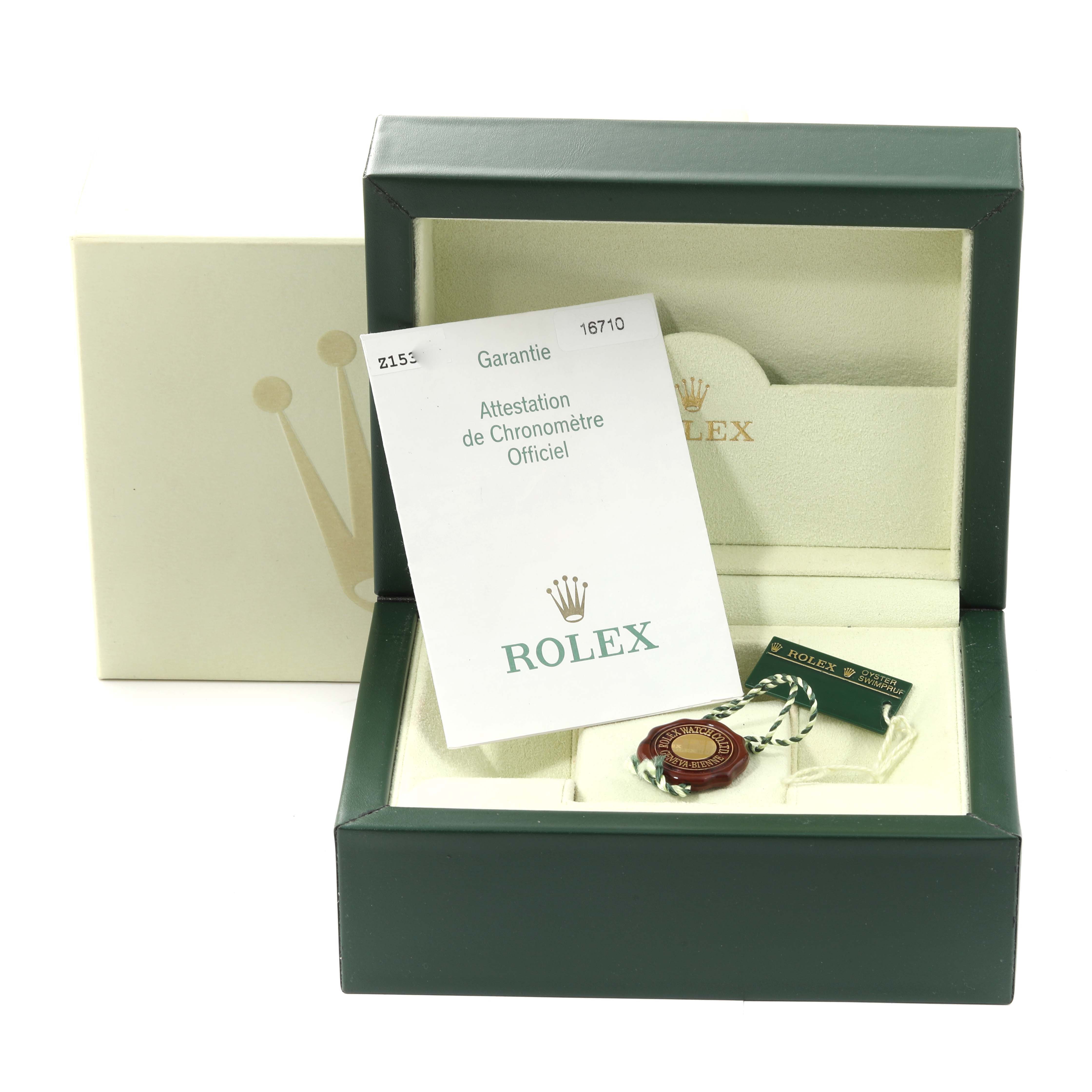 The image shows the packaging, warranty card, and tag for a Rolex GMT-Master 16710 Men's Stainless Steel Black Dial 16710 Men's Stainless Steel Black Dial watch.